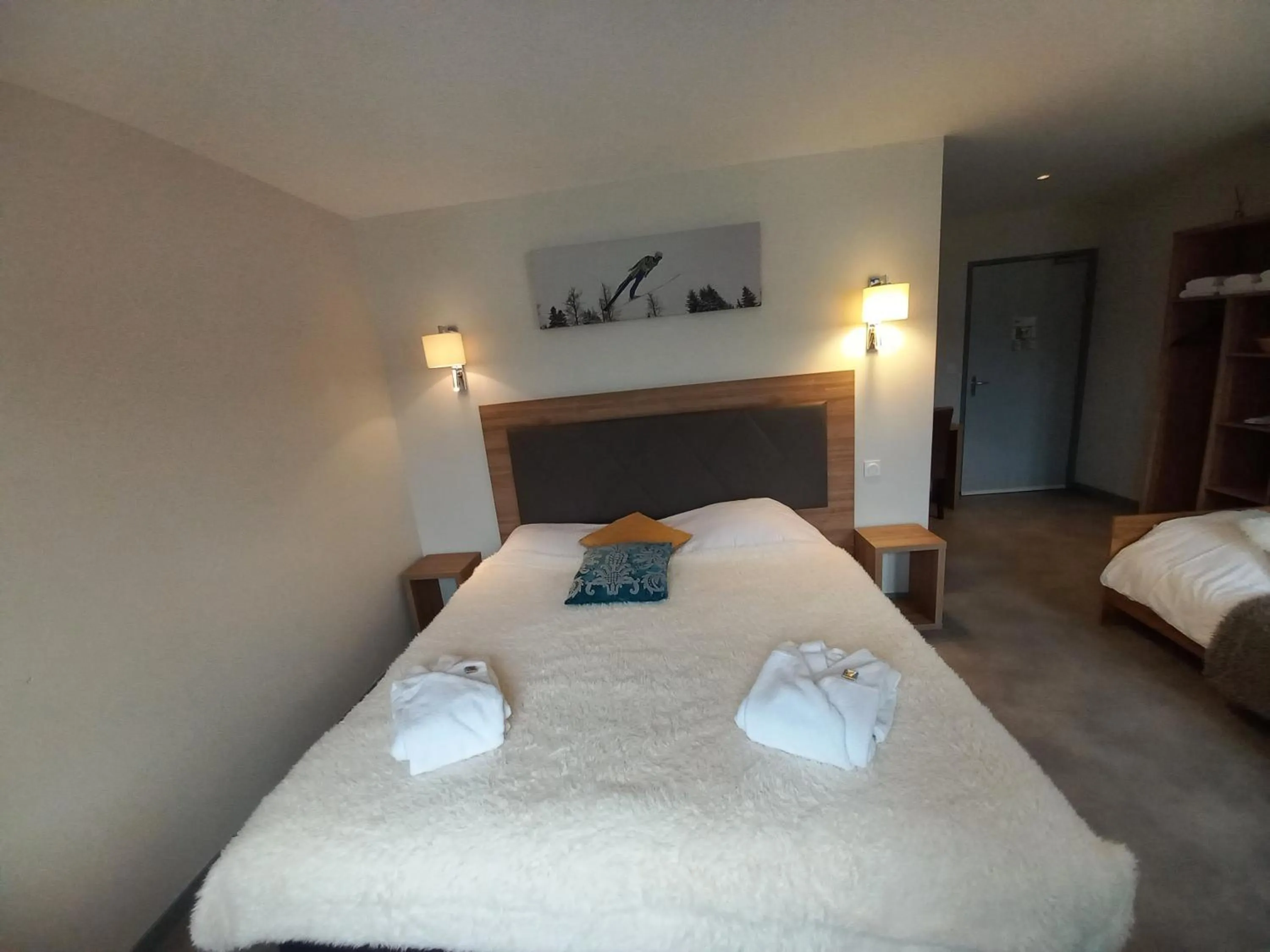 Bed in SARL DU PARC Hôtel Les Tremplins