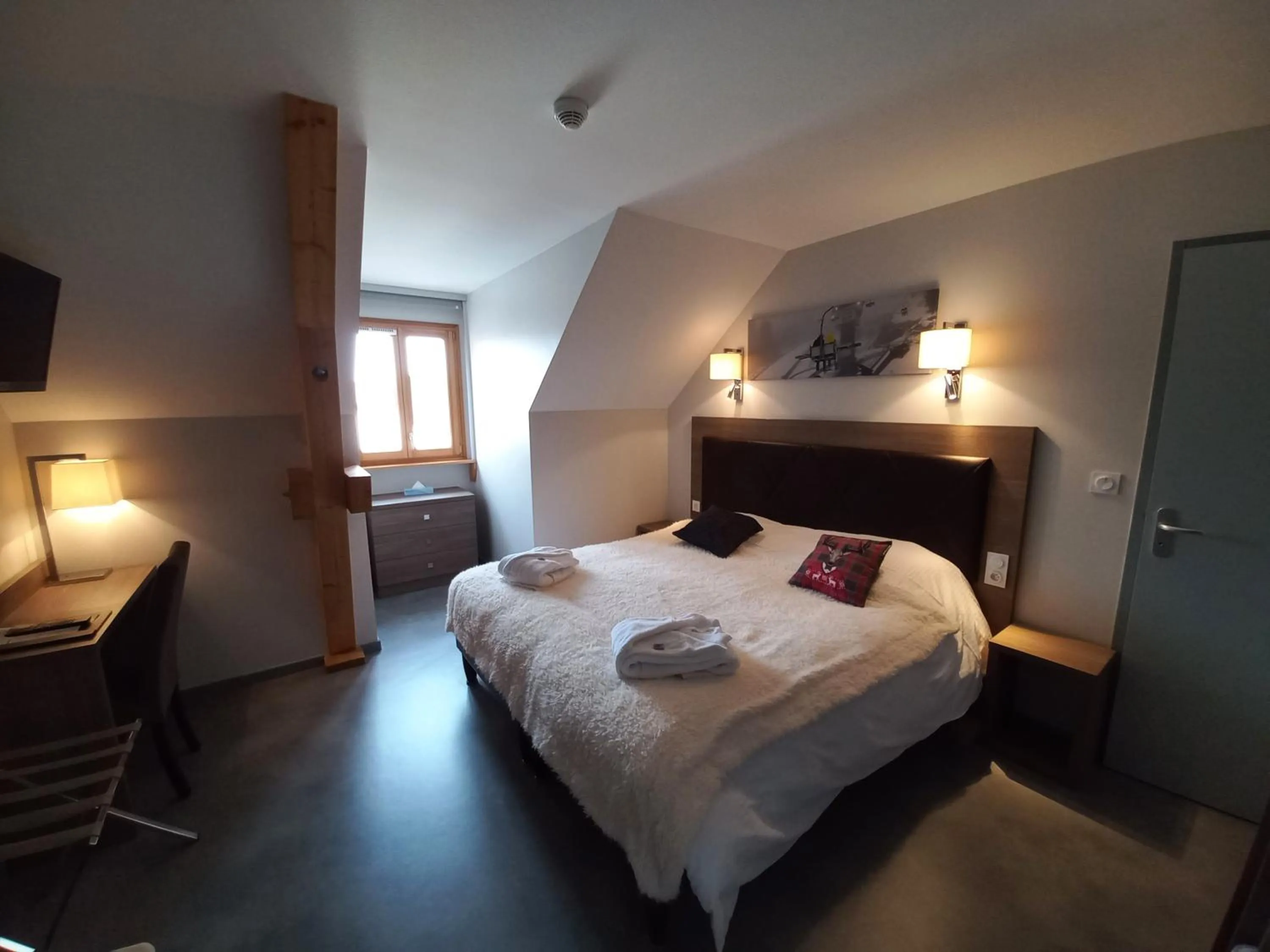 Bed in SARL DU PARC Hôtel Les Tremplins