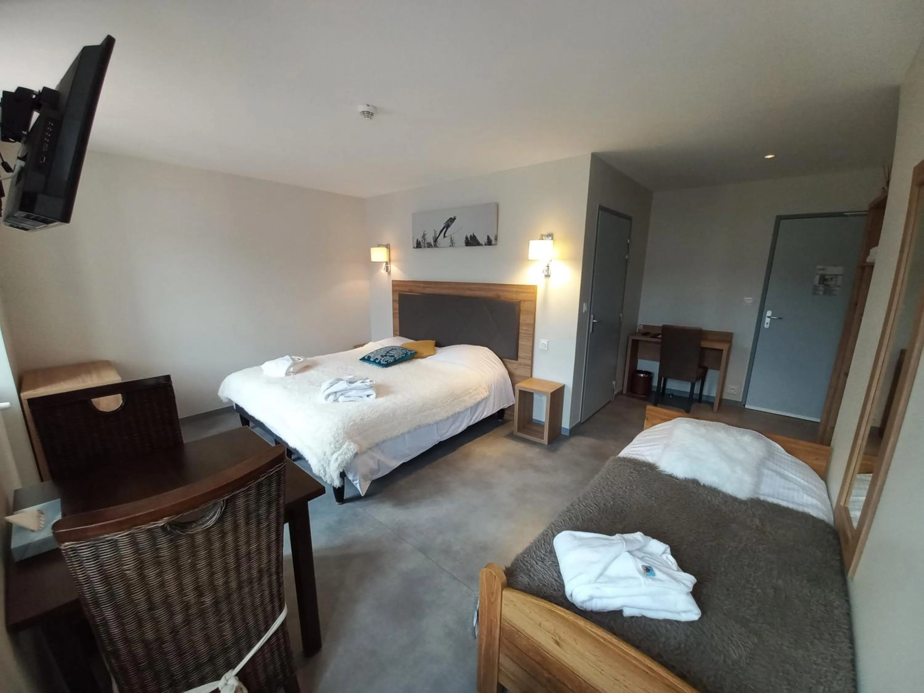 Bed in SARL DU PARC Hôtel Les Tremplins