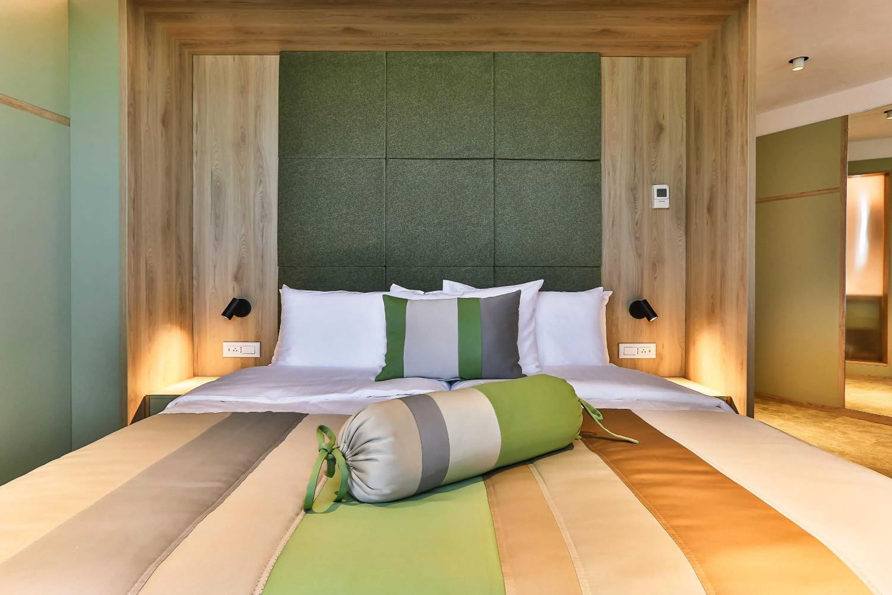 Bed in Carine Hotel Centar