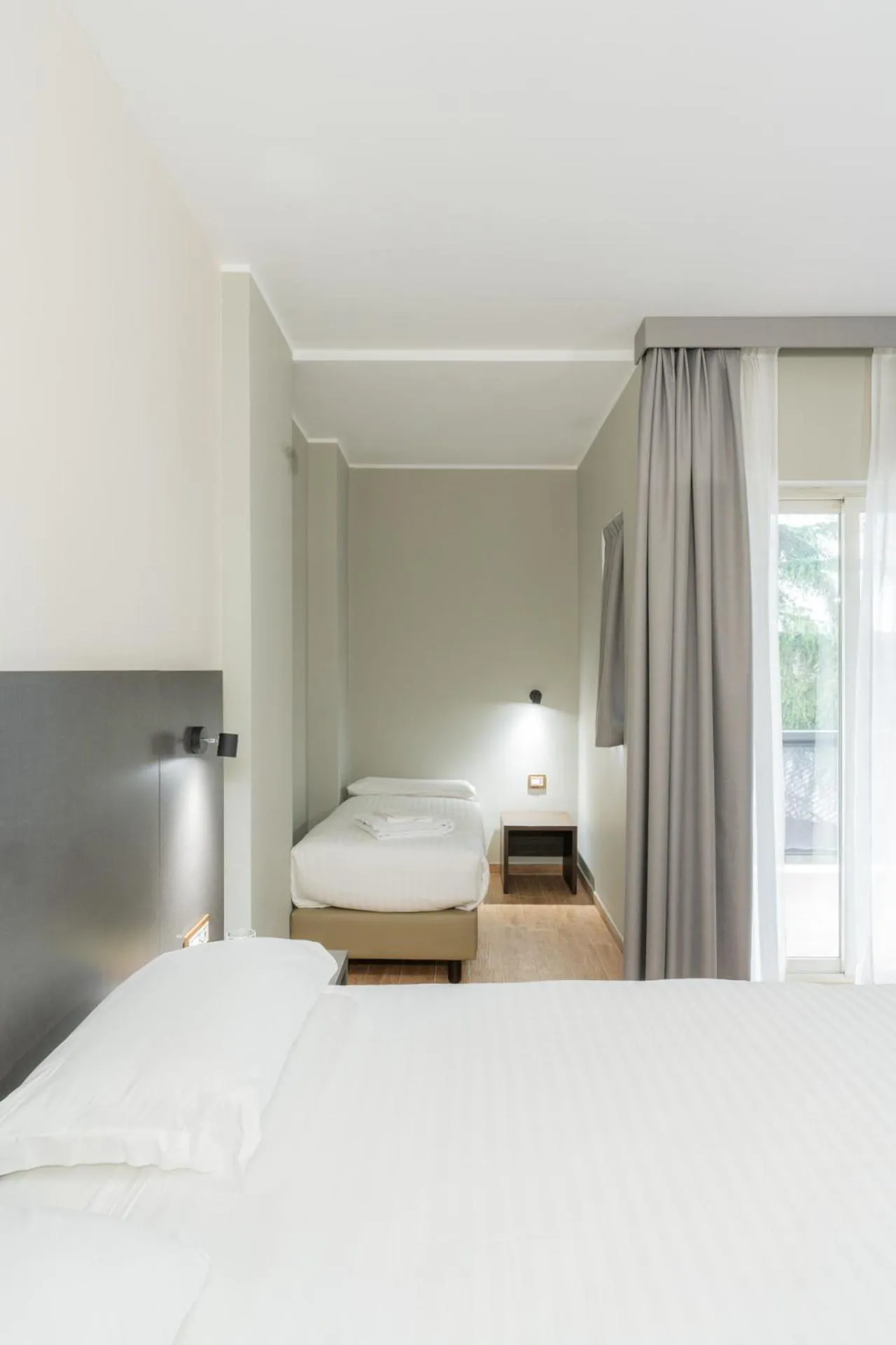 Bed in Hotel Pineta Palace