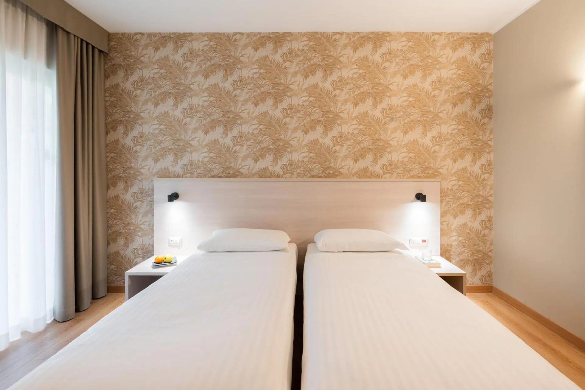 Bed in Hotel Pineta Palace