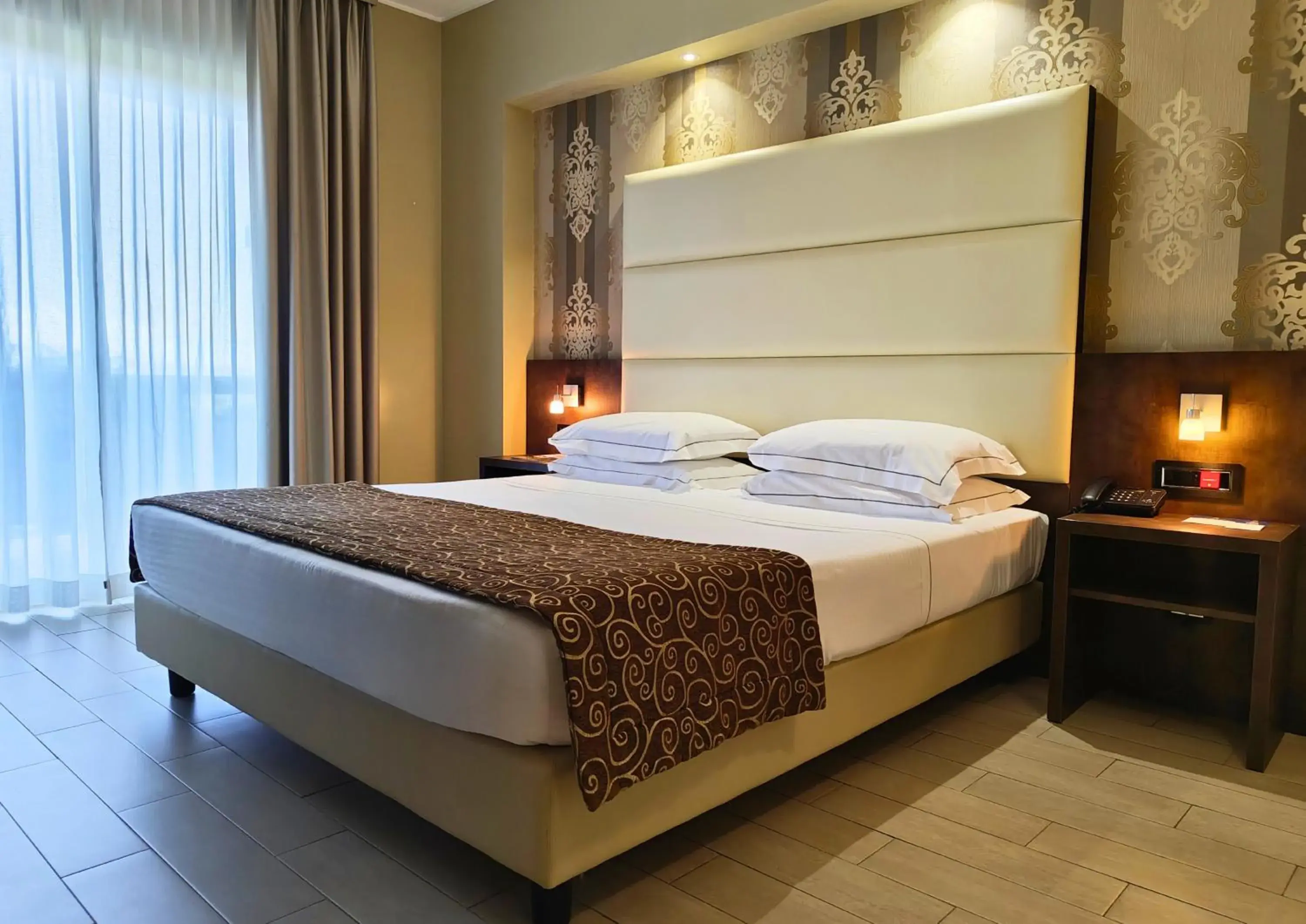 Bed in Hotel Pineta Palace Bed in Hotel Pineta Palace