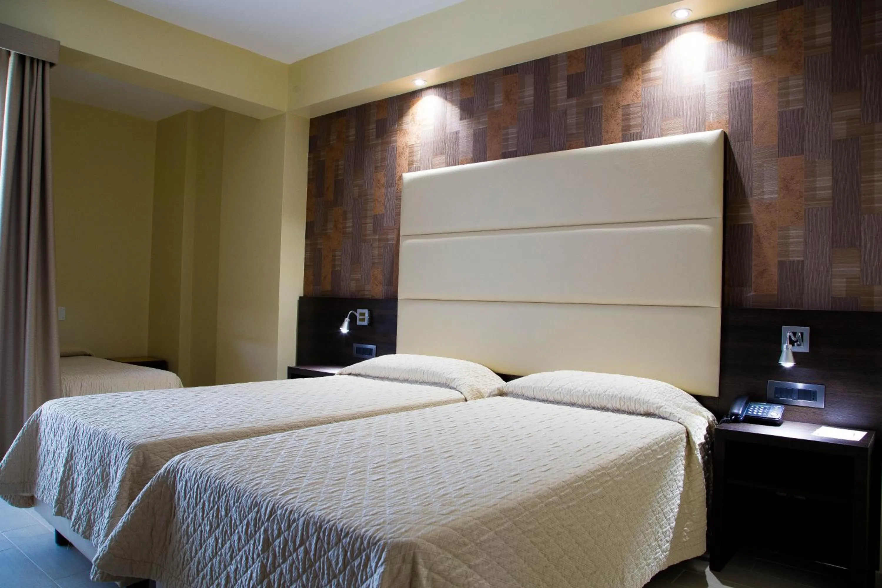 Bed in Hotel Pineta Palace