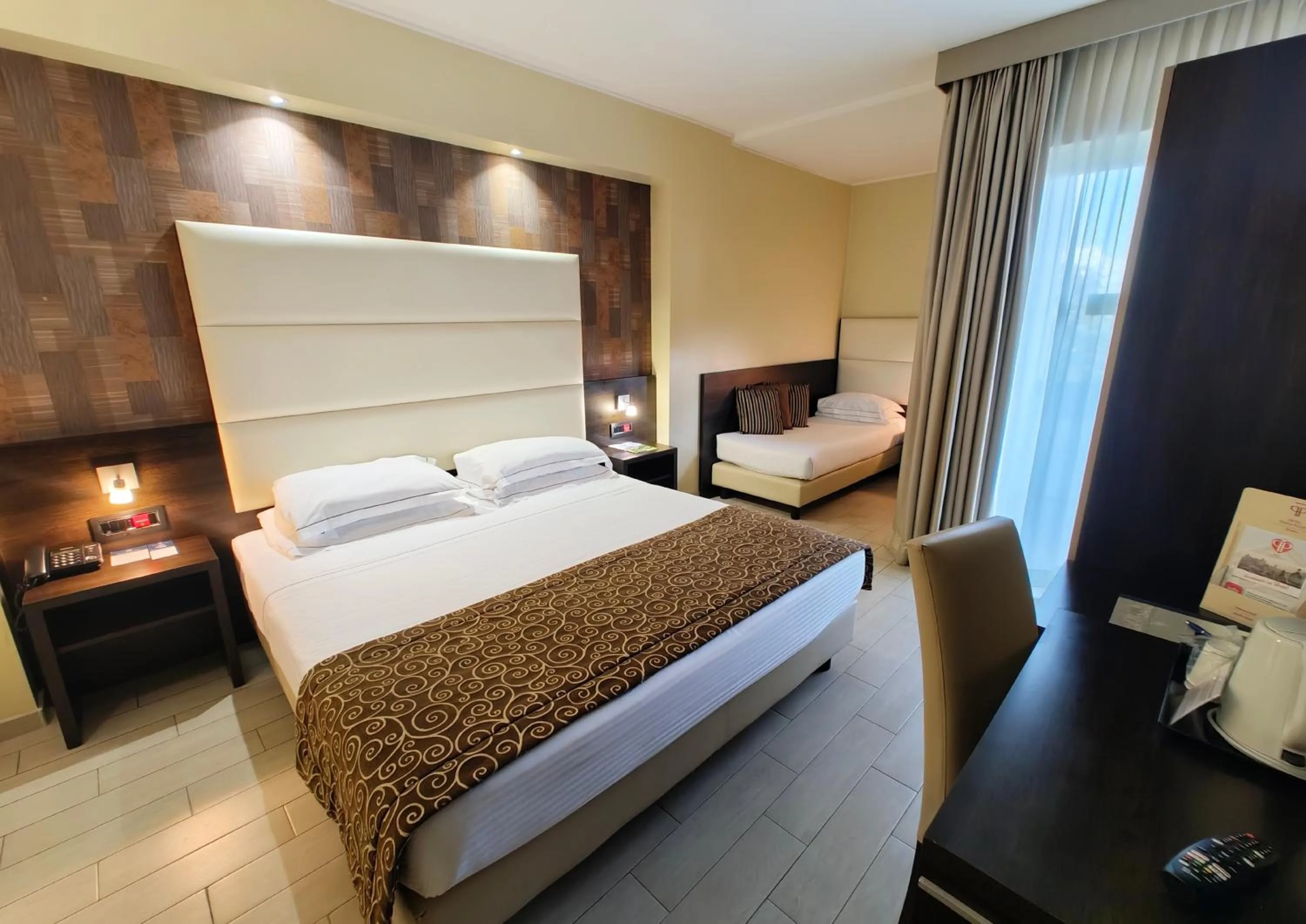 Bed in Hotel Pineta Palace