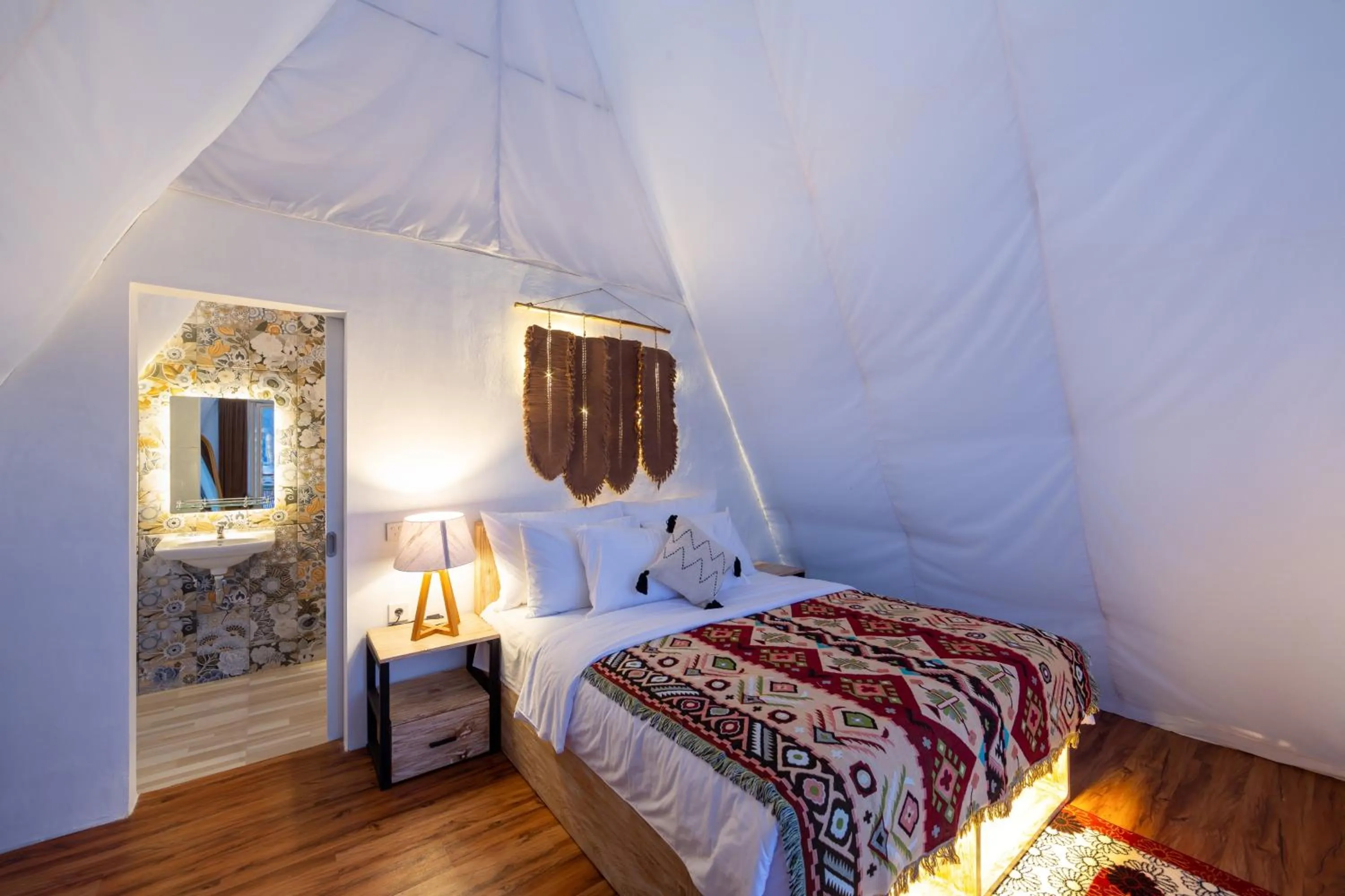 Bed in The Dewi Kintamani Luxury Glamping and Natural Hotspring