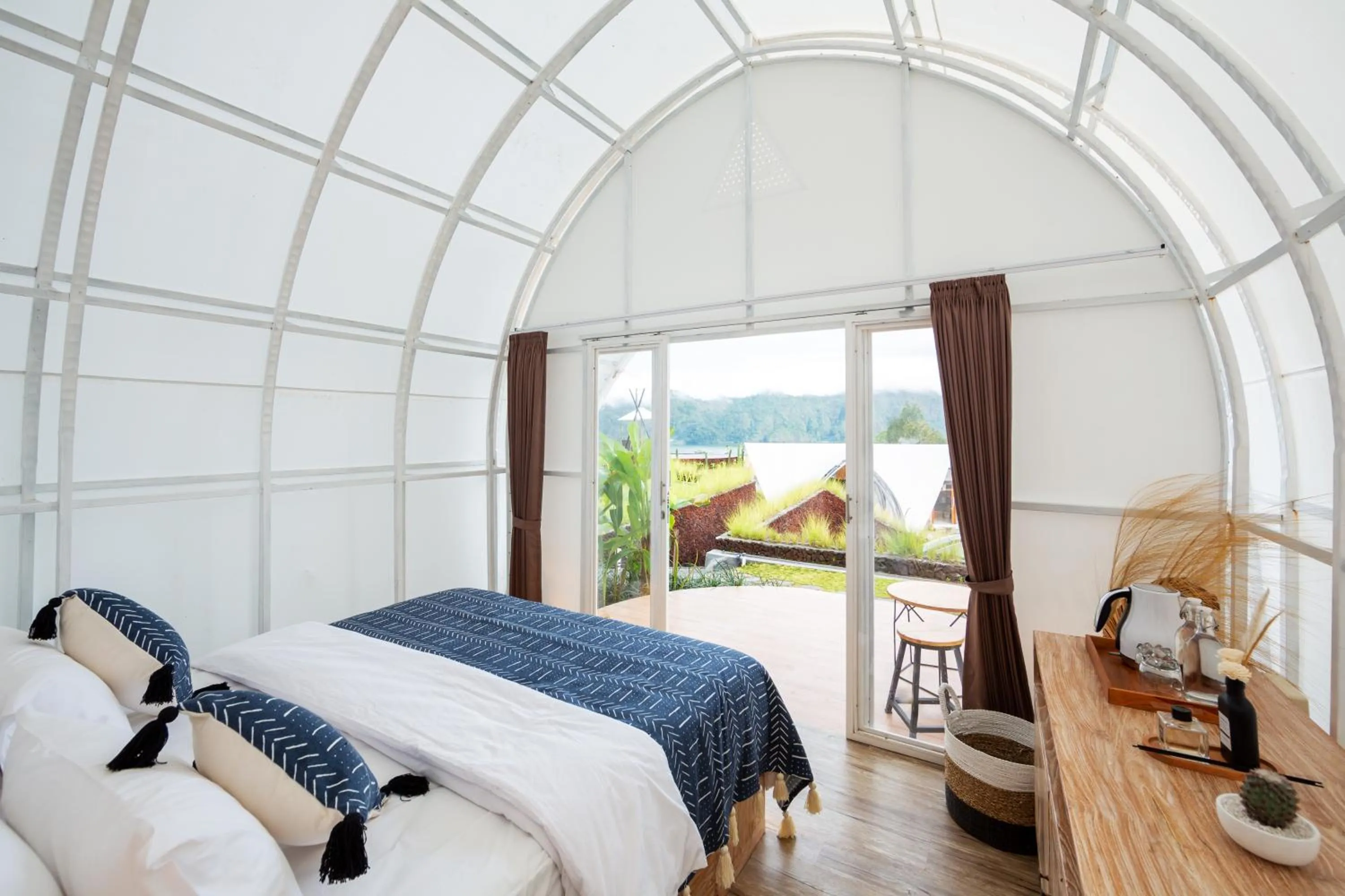 Bed in The Dewi Kintamani Luxury Glamping and Natural Hotspring