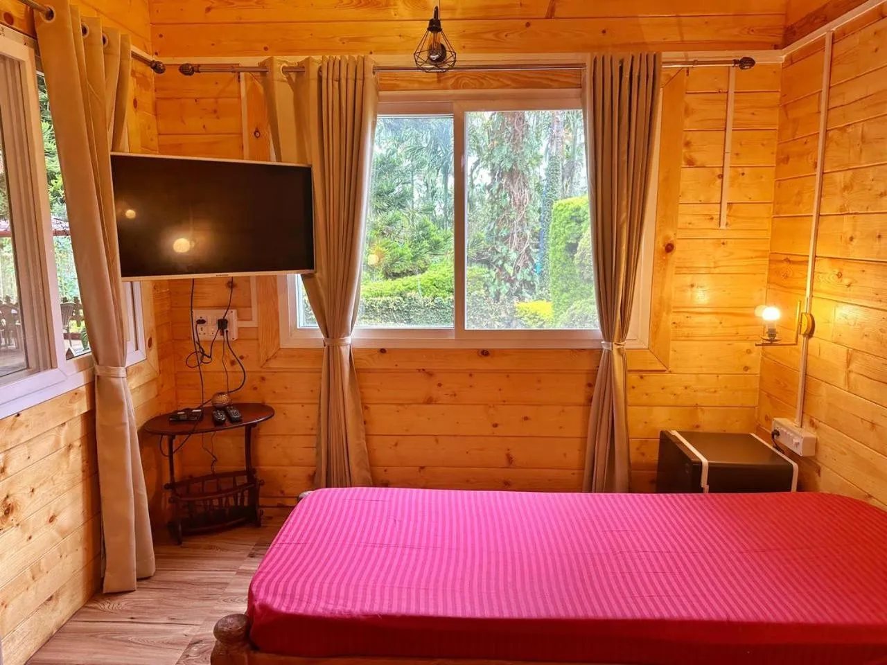 TV and multimedia, Bed in Oxyzone Coorg by StayApart