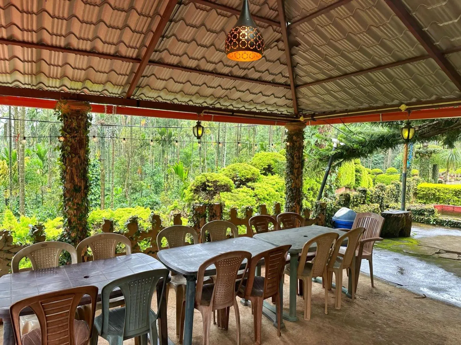 Dining area in Oxyzone Coorg by StayApart