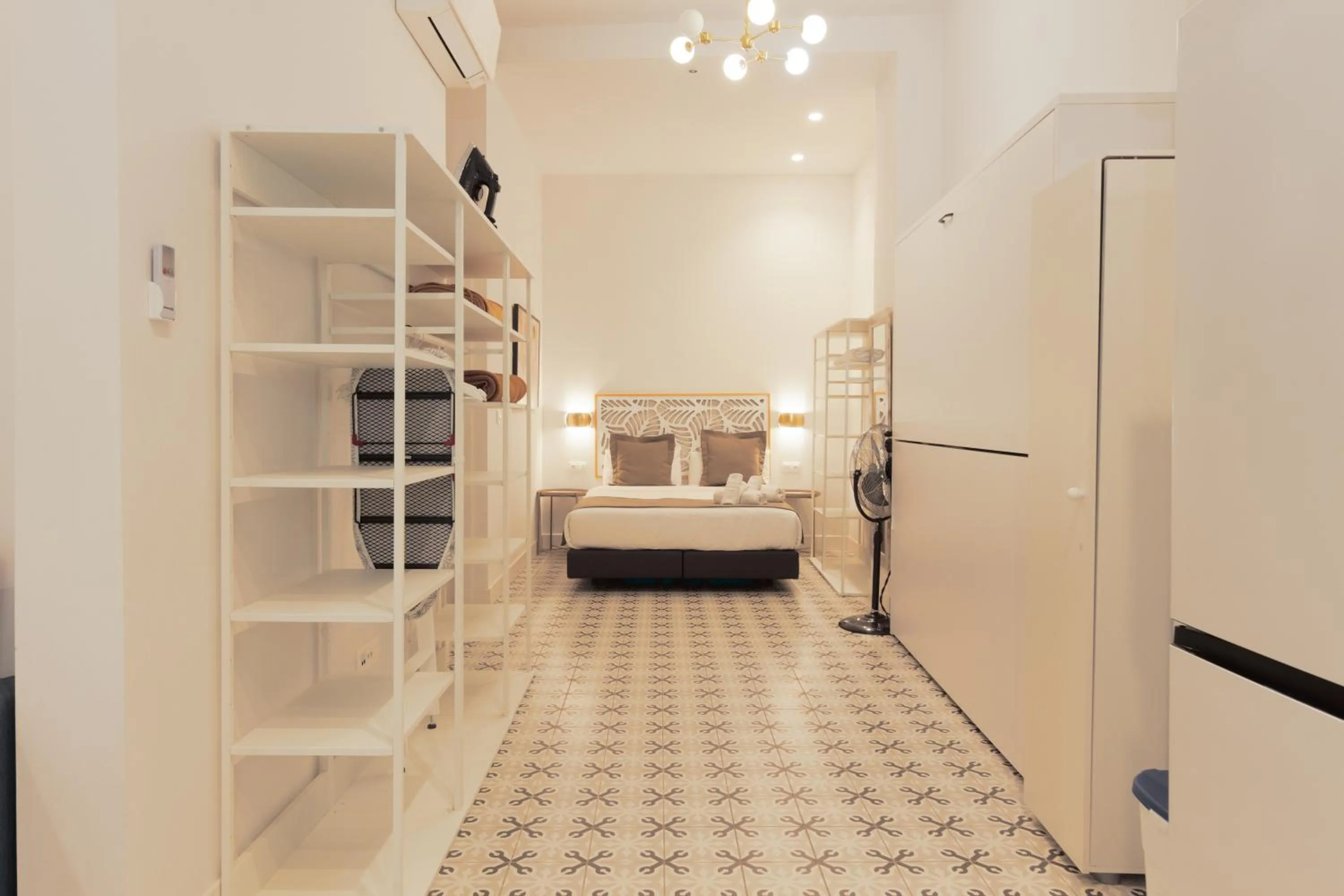 Bed in Apartamentos Teatro by Be Alicante