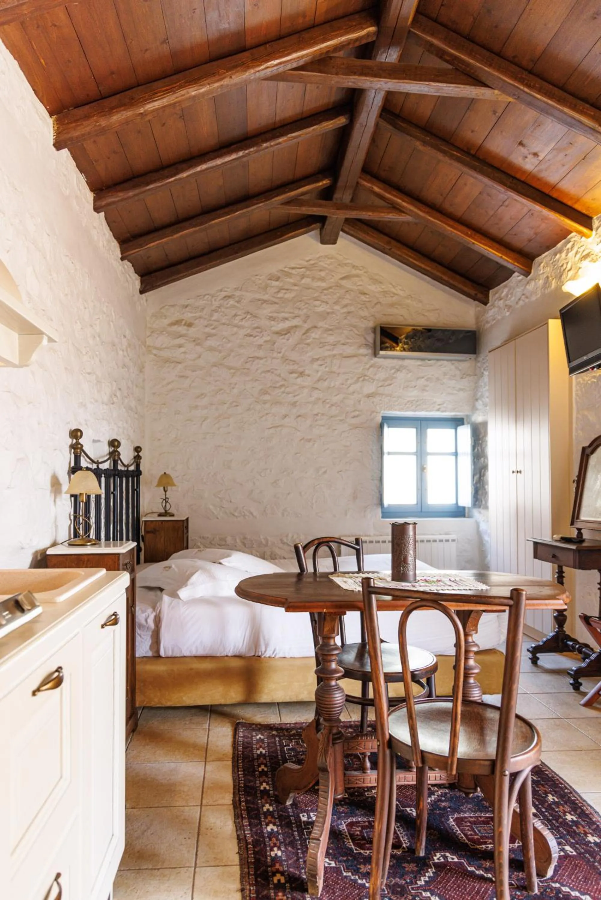 Bedroom in Lithos Stone Suites