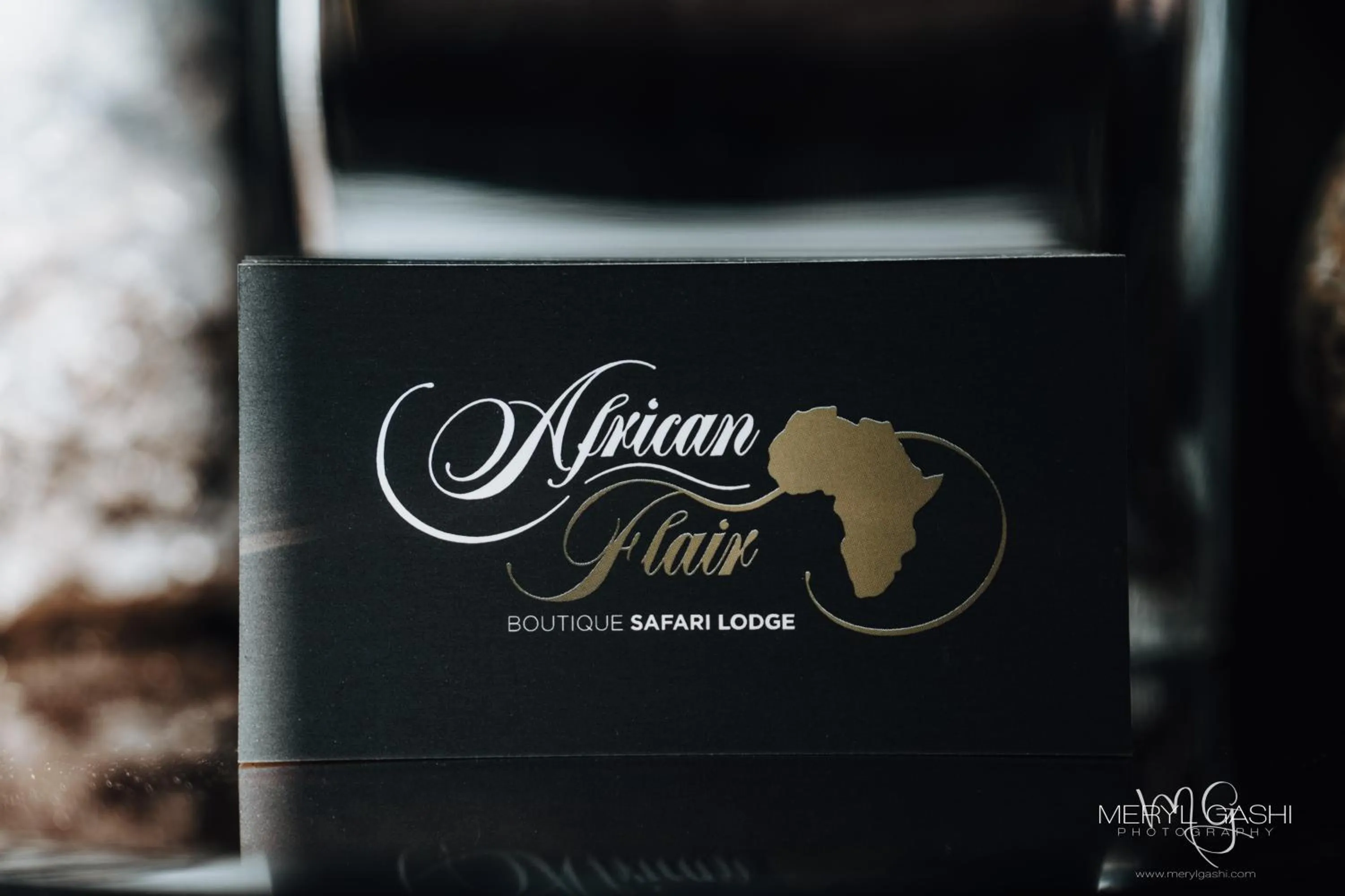 Property logo or sign in African Flair Boutique Safari Lodge