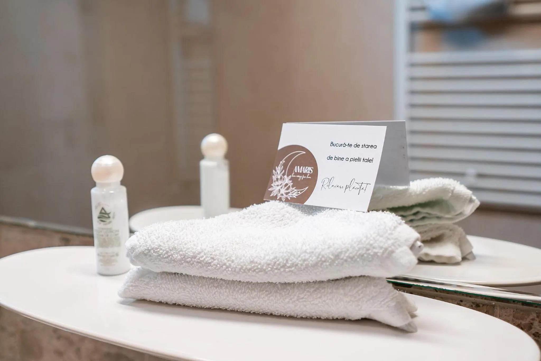 towels in Amaris ApartHotel la 2 Pași de Plajă & Parcare Gratuită