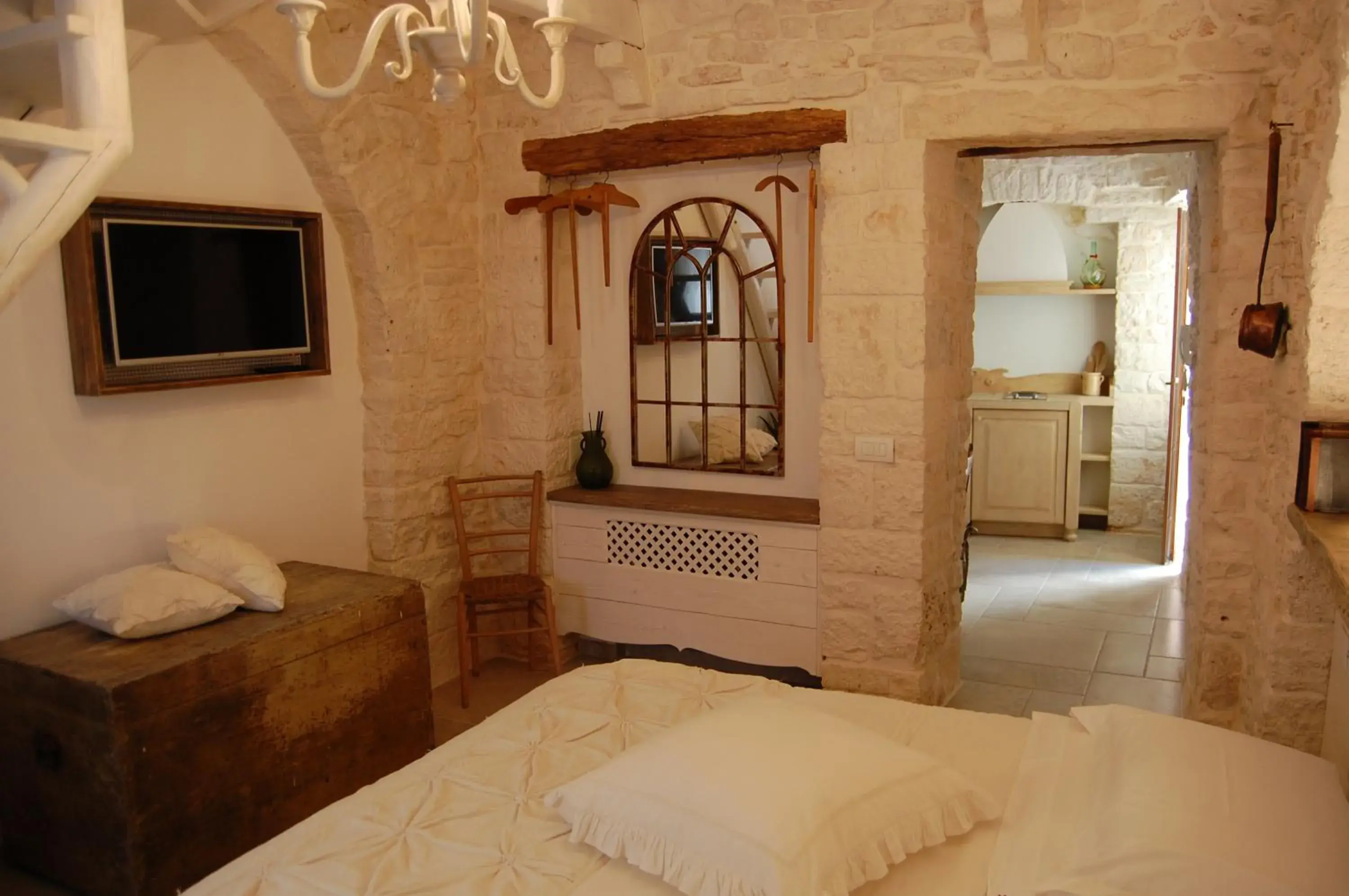 Photo of the whole room, Bed in Trulli Holiday Albergo Diffuso Photo of the whole room, Bed in Trulli Holiday Albergo Diffuso