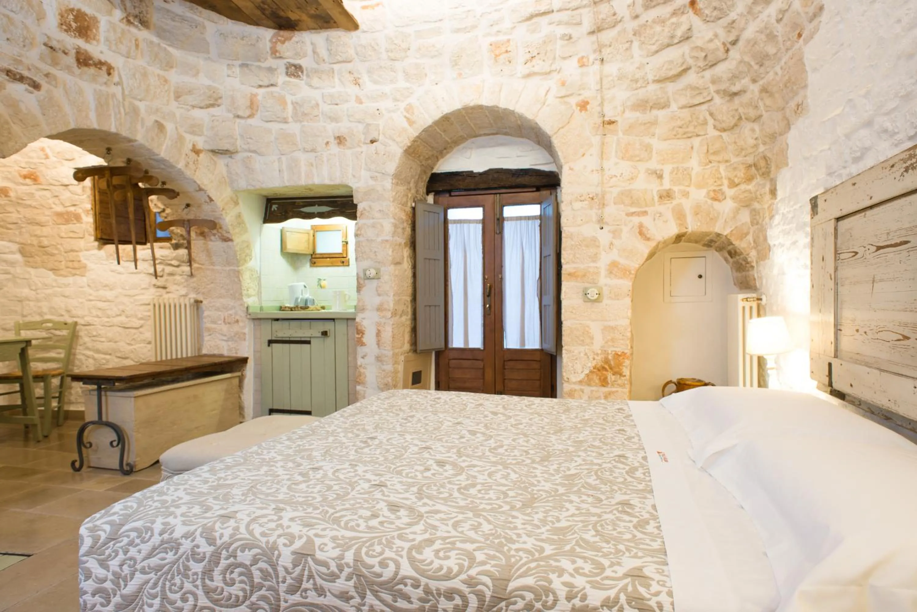 Bedroom, Bed in Trulli Holiday Albergo Diffuso