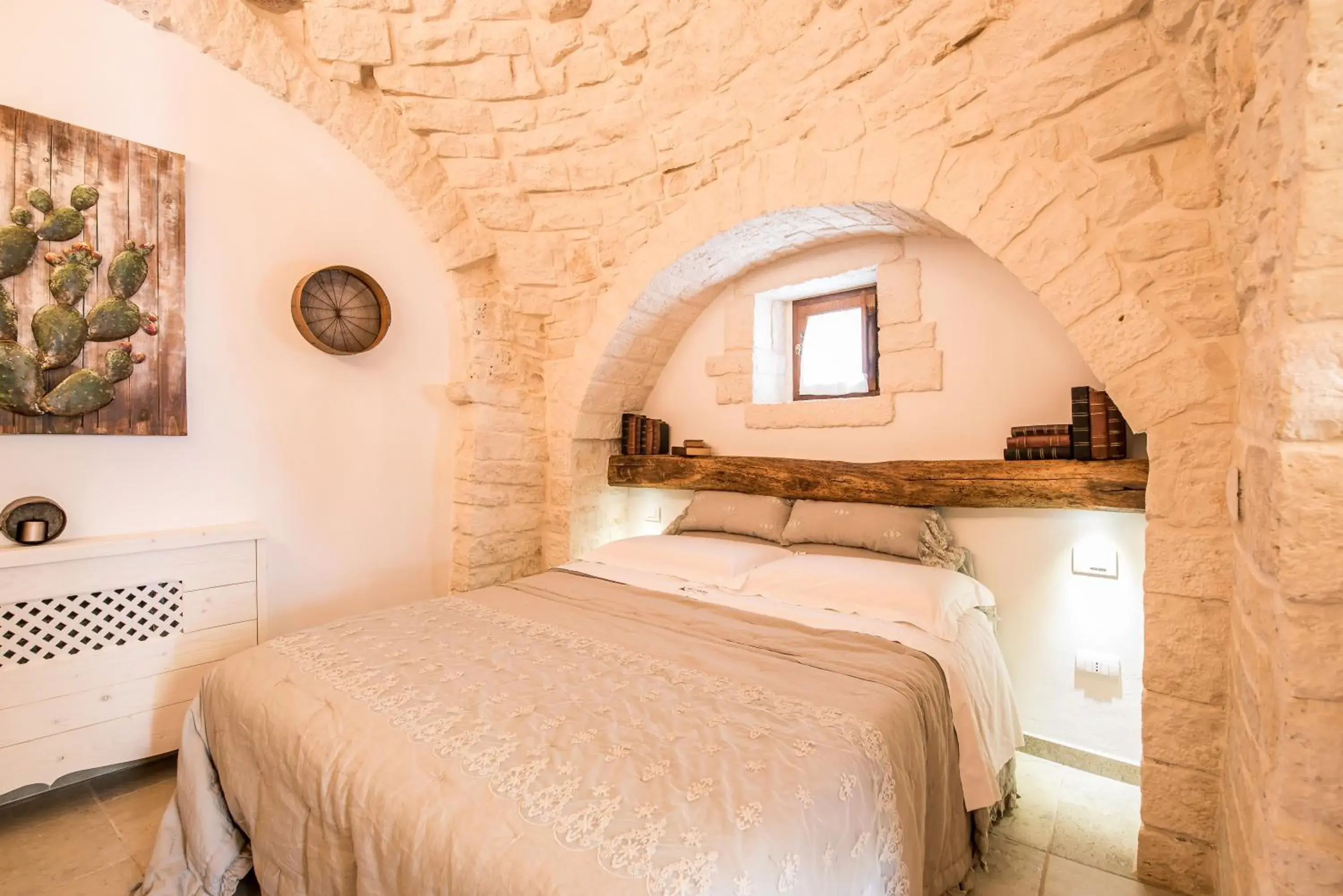 Photo of the whole room, Bed in Trulli Holiday Albergo Diffuso Photo of the whole room, Bed in Trulli Holiday Albergo Diffuso