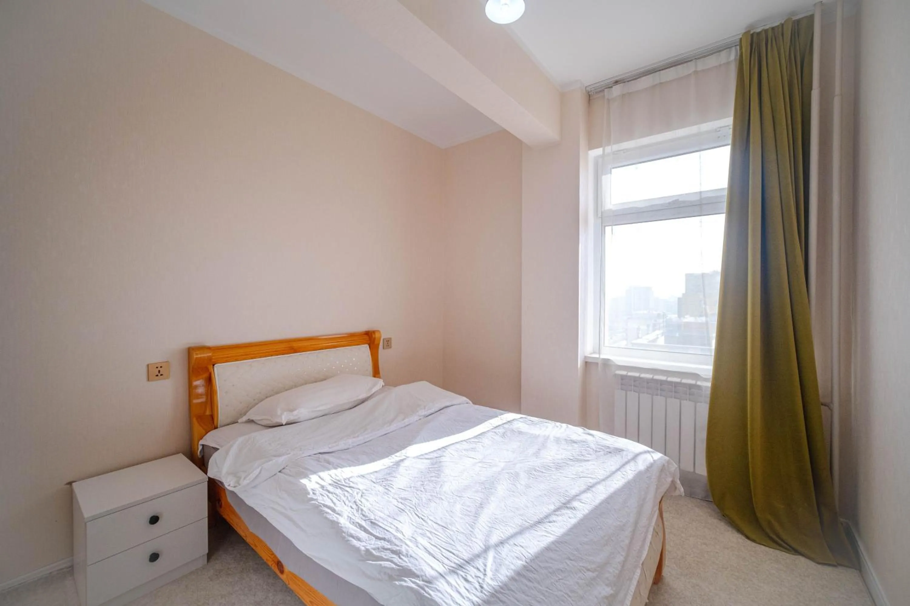 Bedroom, Bed in Eagle Town Serviced Apartment
