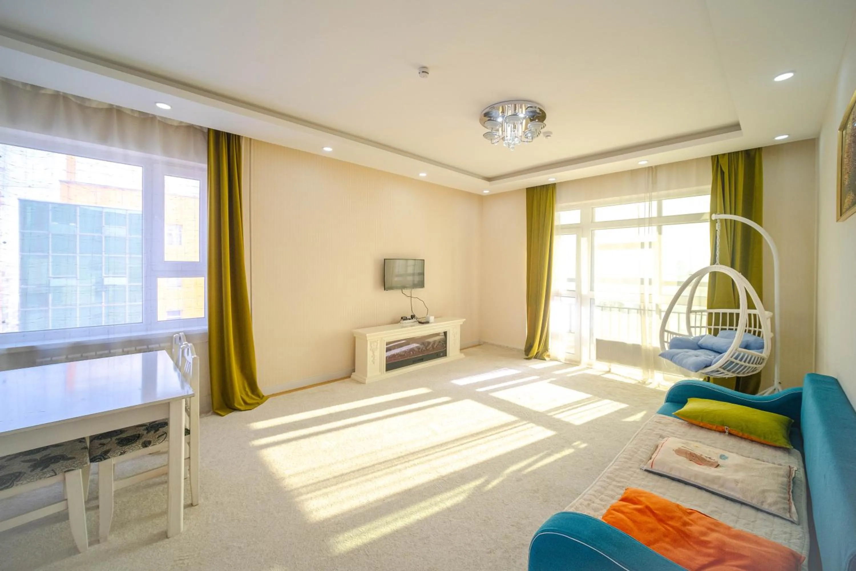 Living room, Bed in Eagle Town Serviced Apartment