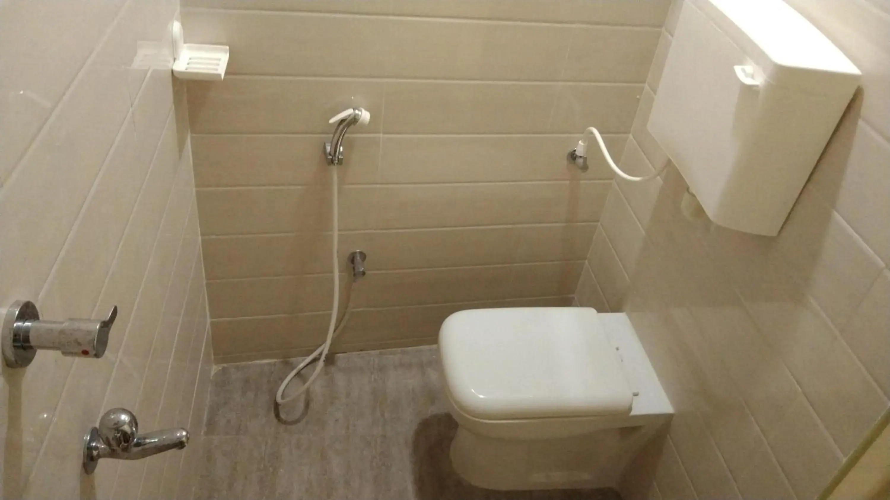 Bathroom in Hotel Grand Stay Bathroom in Hotel Grand Stay