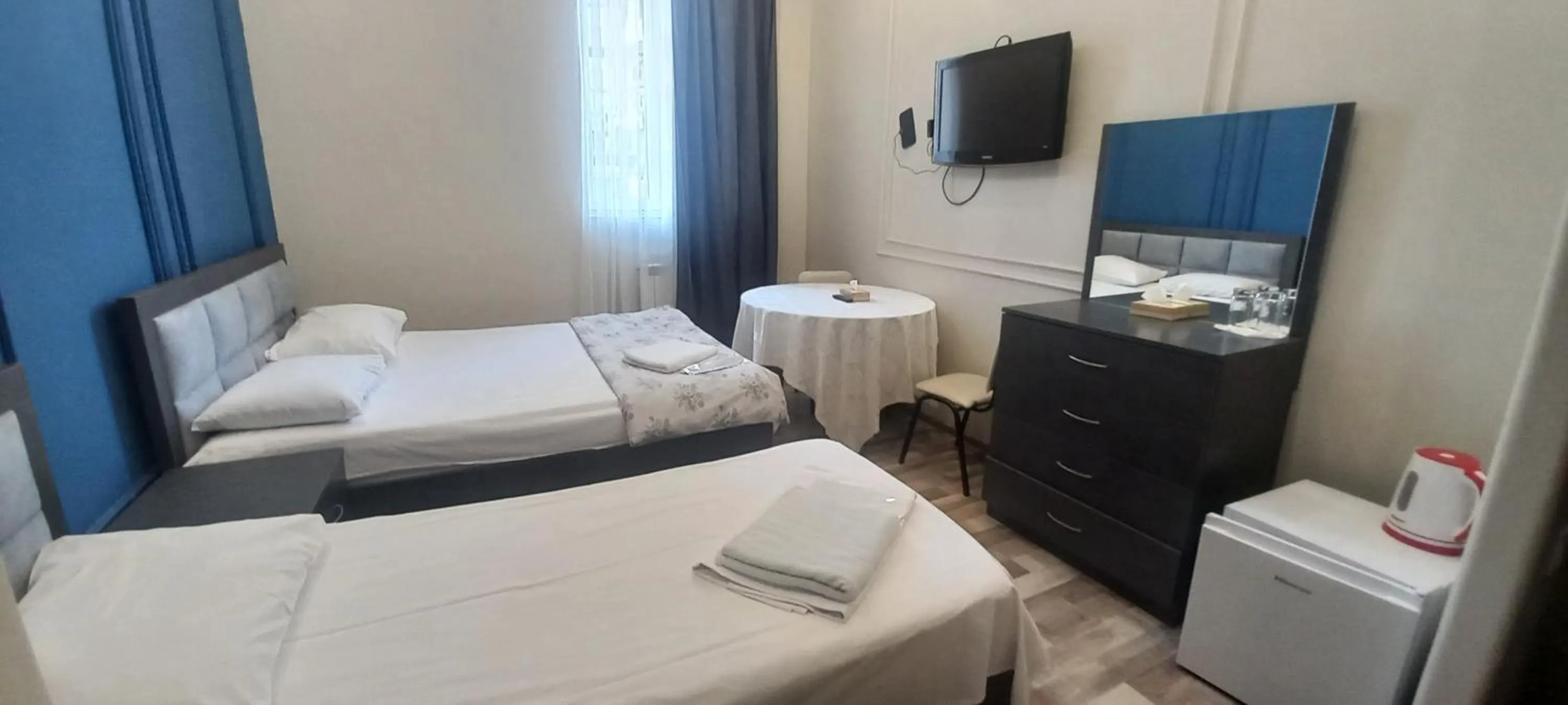 Bed in NEW BELLA HOTEL