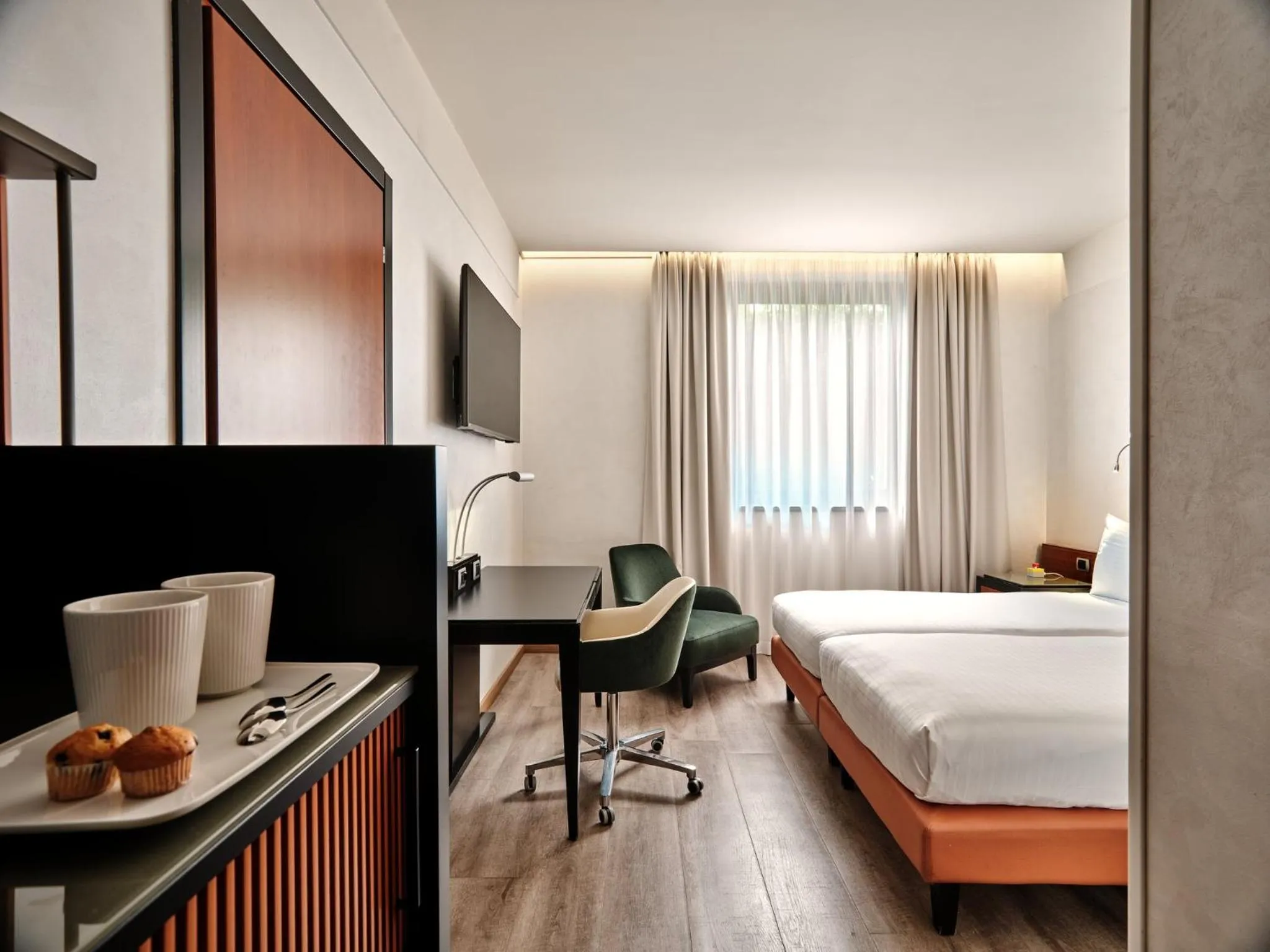 Photo of the whole room, Bed in Crowne Plaza Milan - Malpensa Airport by IHG