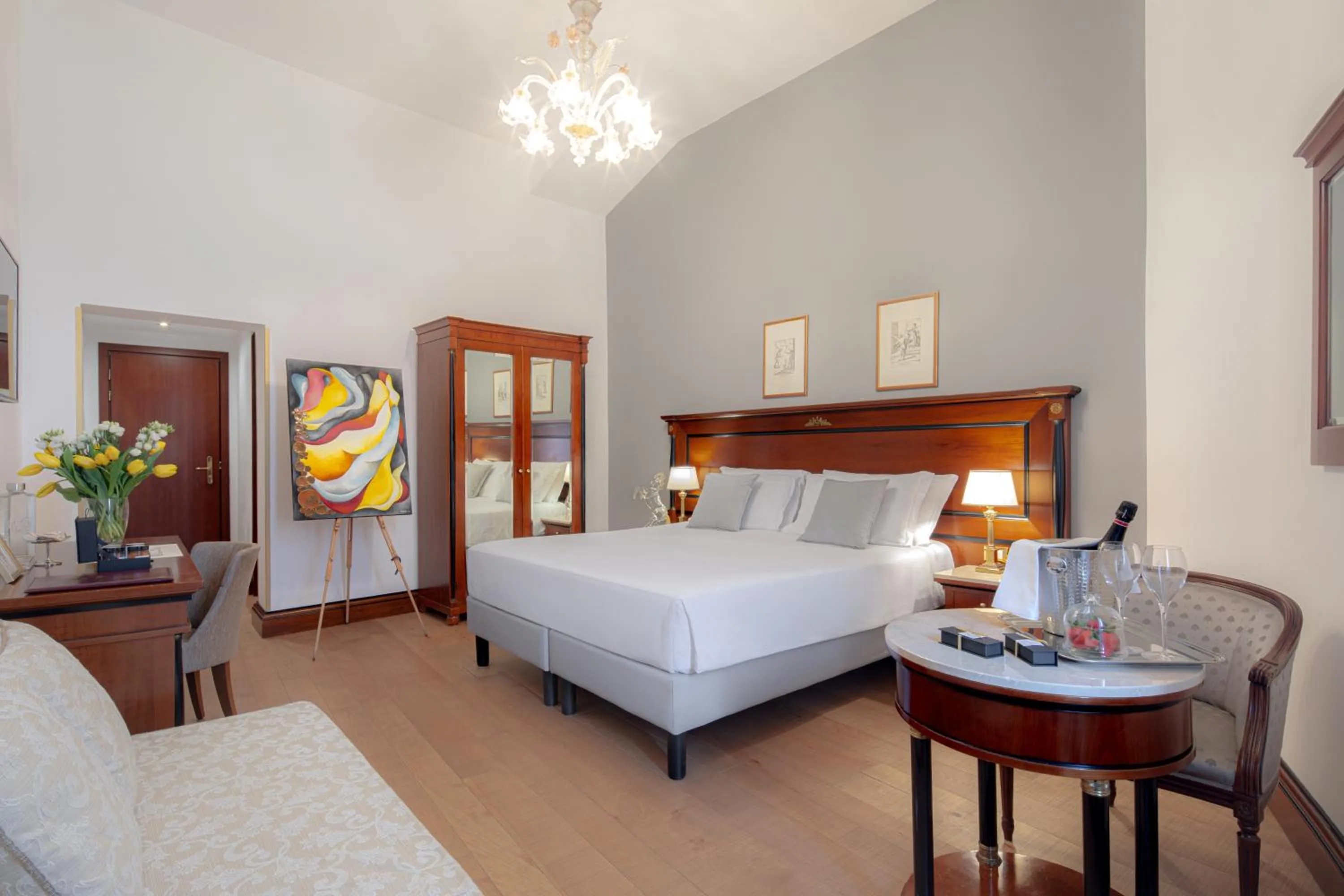 Bed in All’Angelo Art Hotel