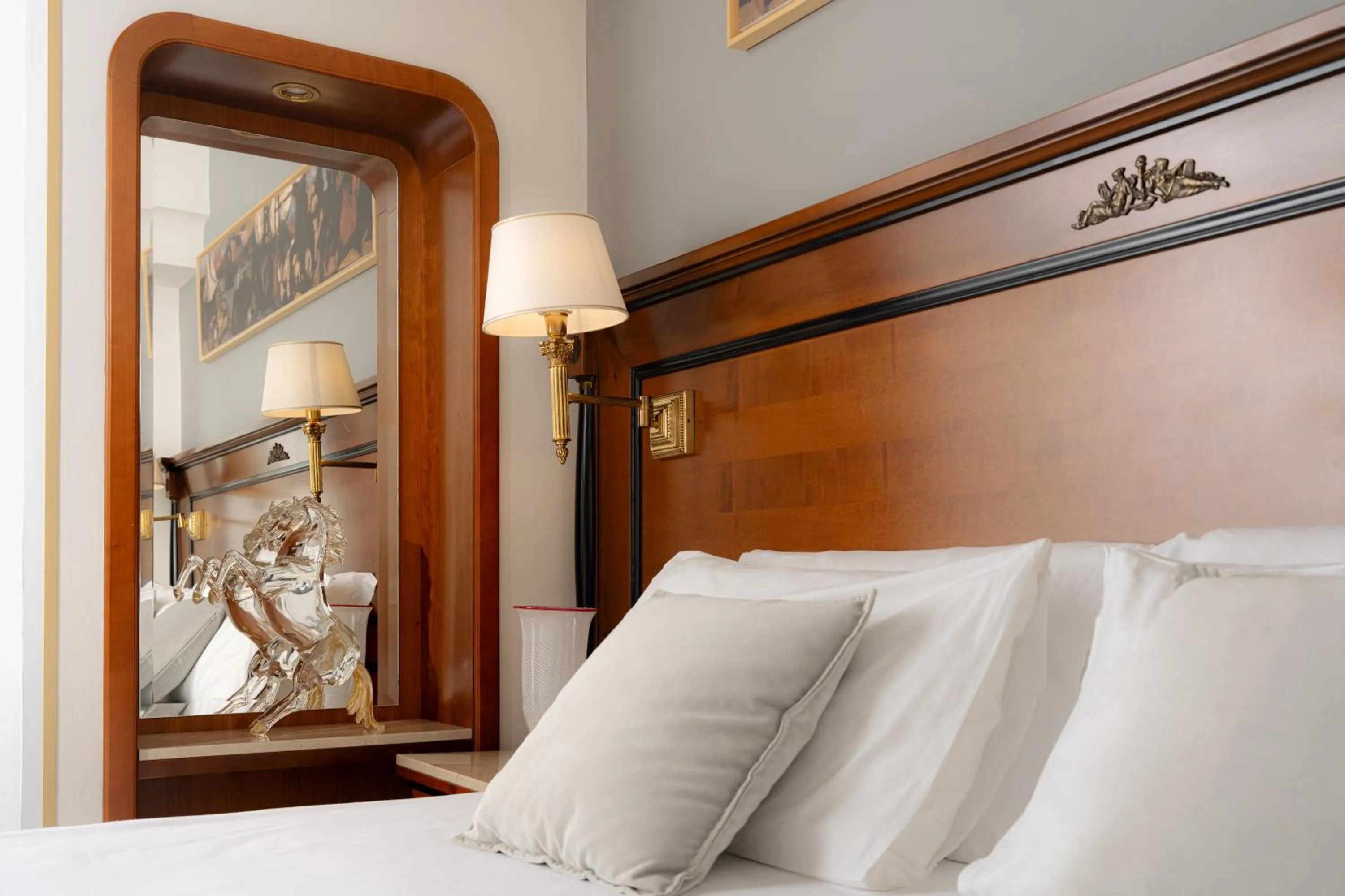 Bed in All’Angelo Art Hotel