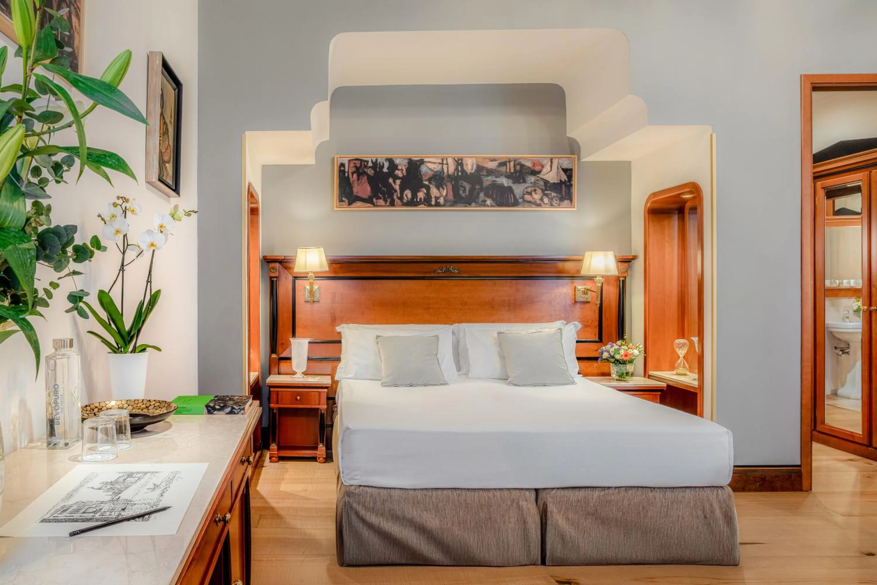 Bed in All’Angelo Art Hotel