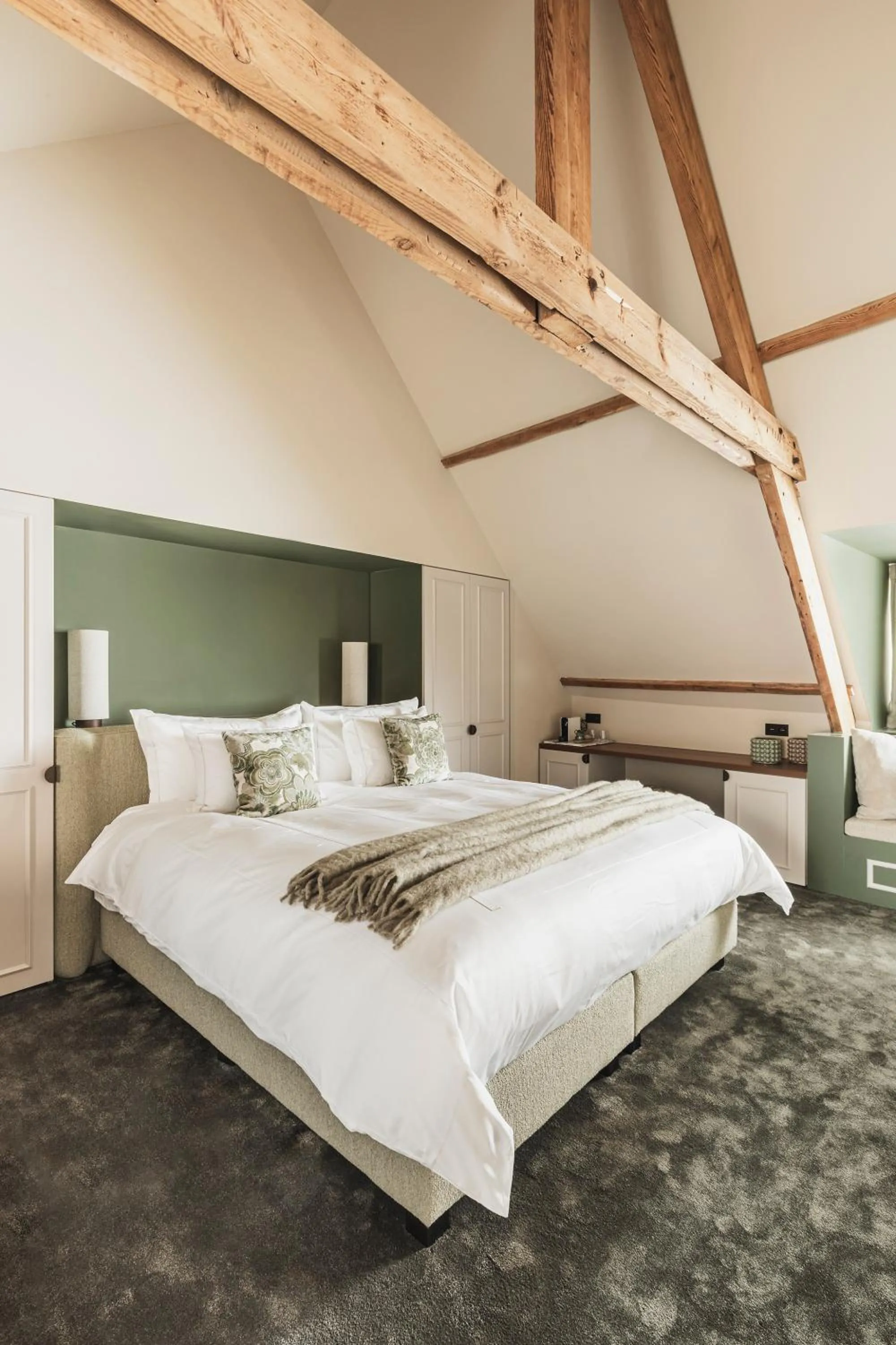 Bed in Raphaëlles Boutique b&b