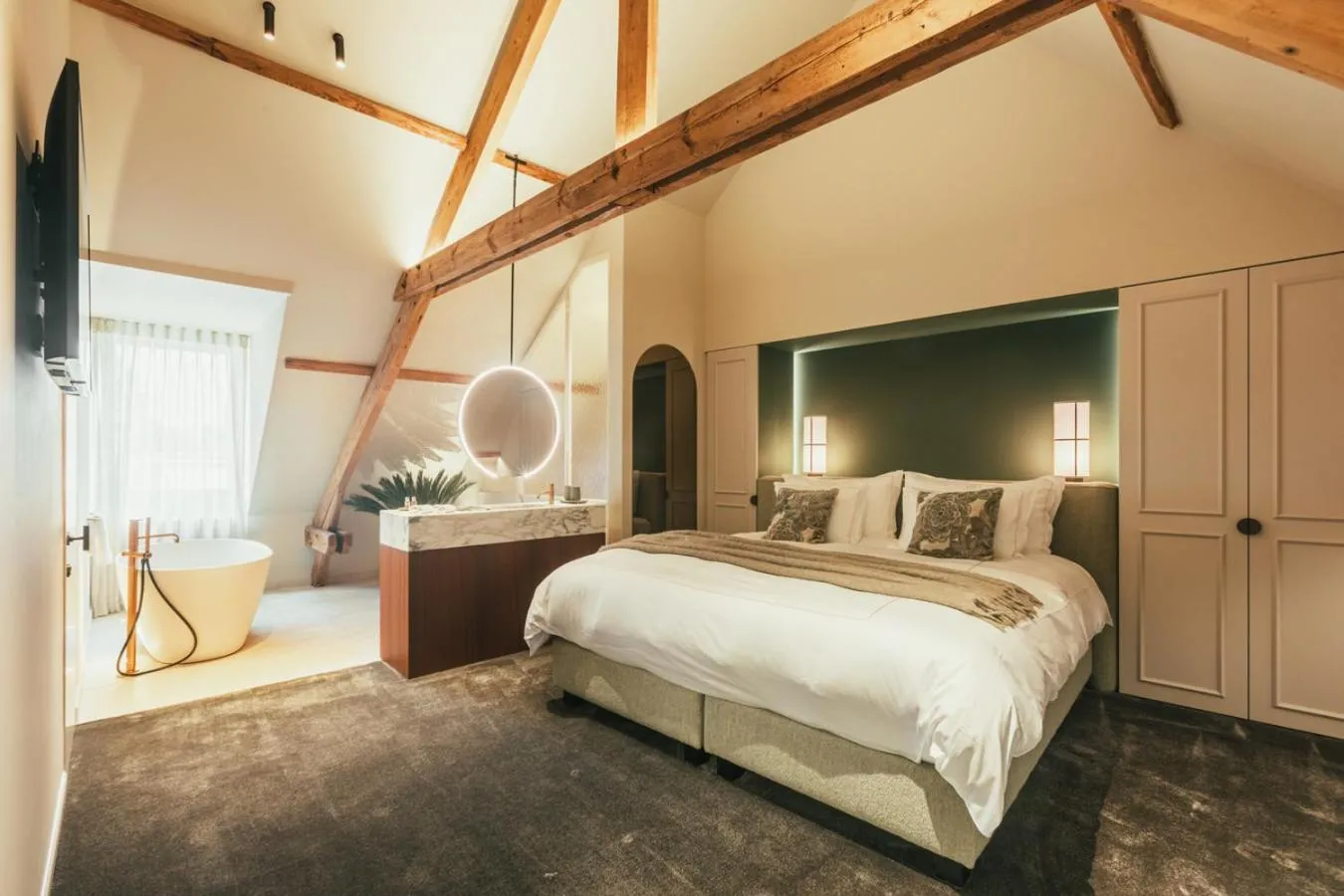 Bed in Raphaëlles Boutique b&b