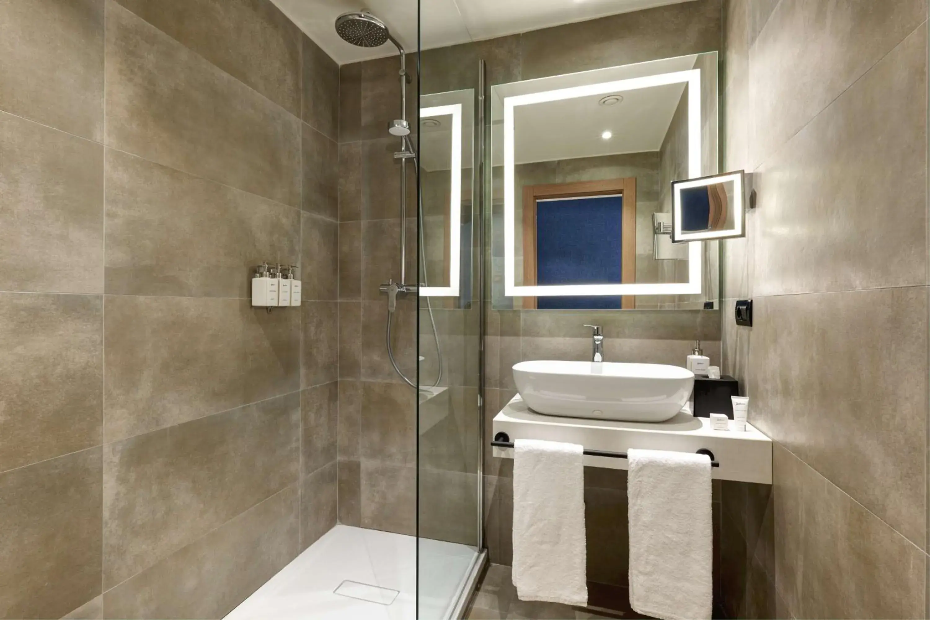 Bathroom in Radisson Hotel Ferrara Bathroom in Radisson Hotel Ferrara