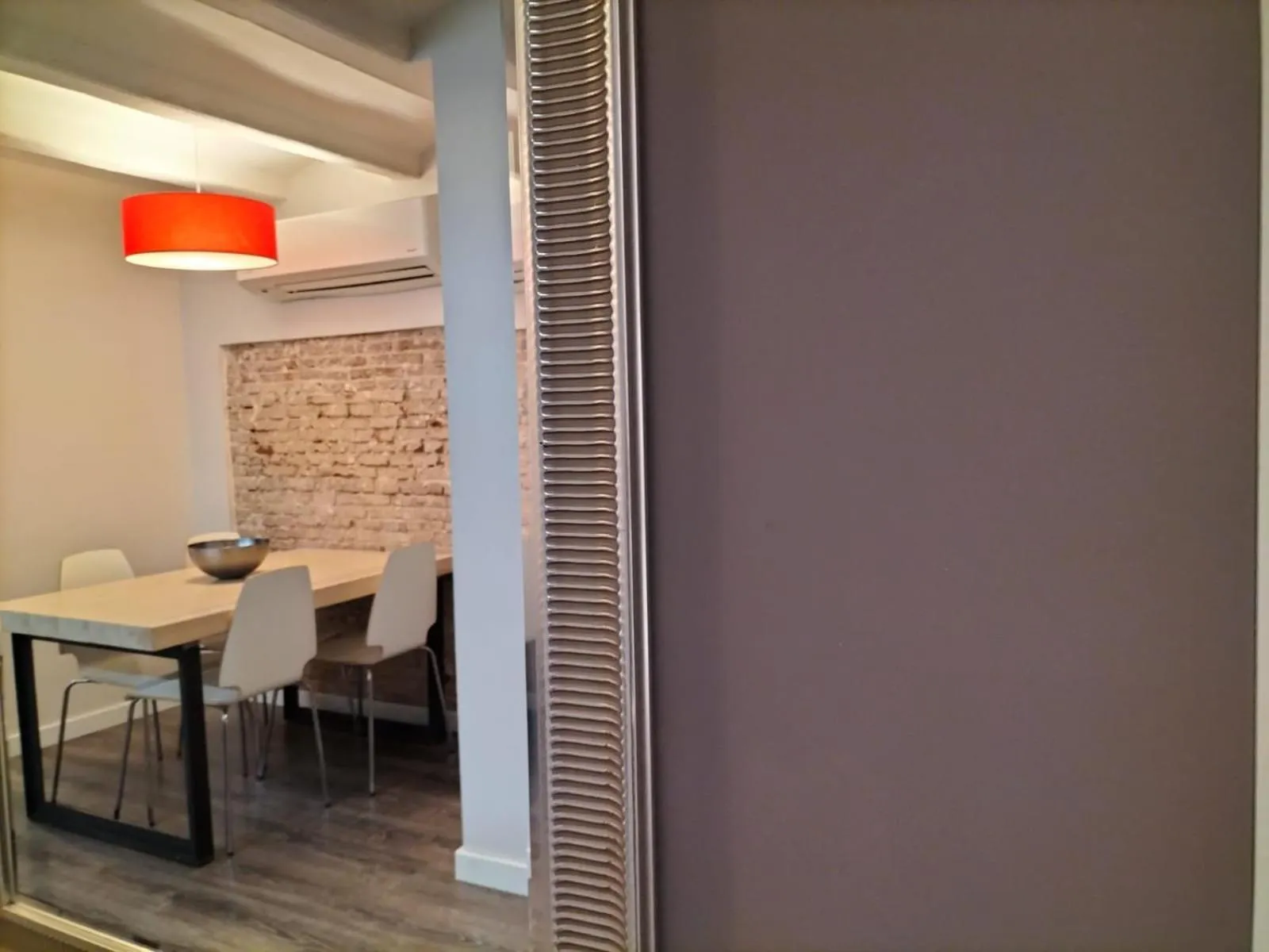 Dining area in Montserrat Apartments by gaiarooms