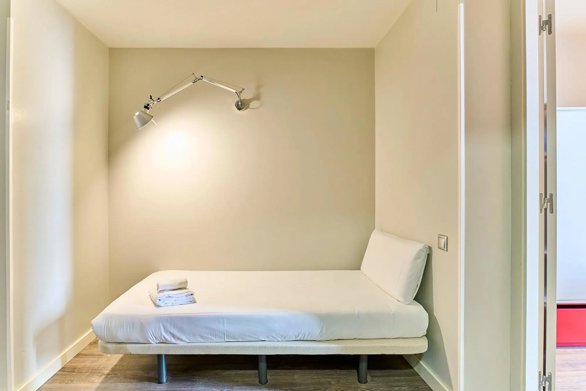 Bed in Montserrat Apartments by gaiarooms