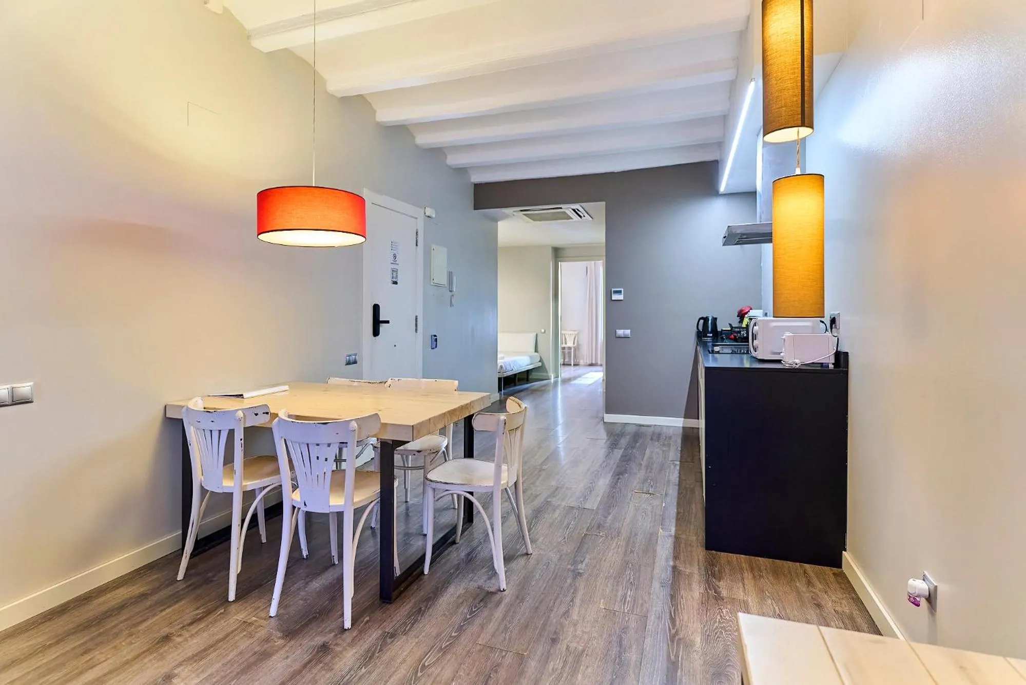 Kitchen or kitchenette in Montserrat Apartments by gaiarooms