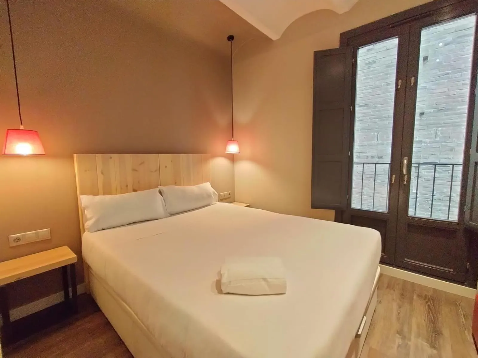 Bed in Montserrat Apartments by gaiarooms