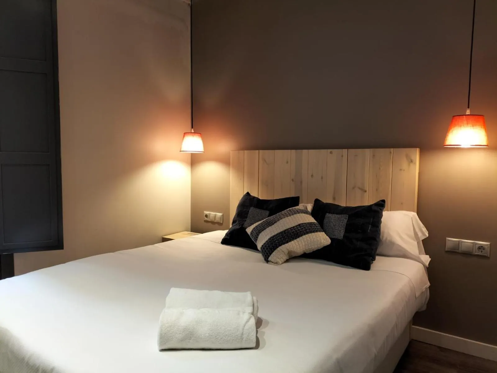 Bed in Montserrat Apartments by gaiarooms