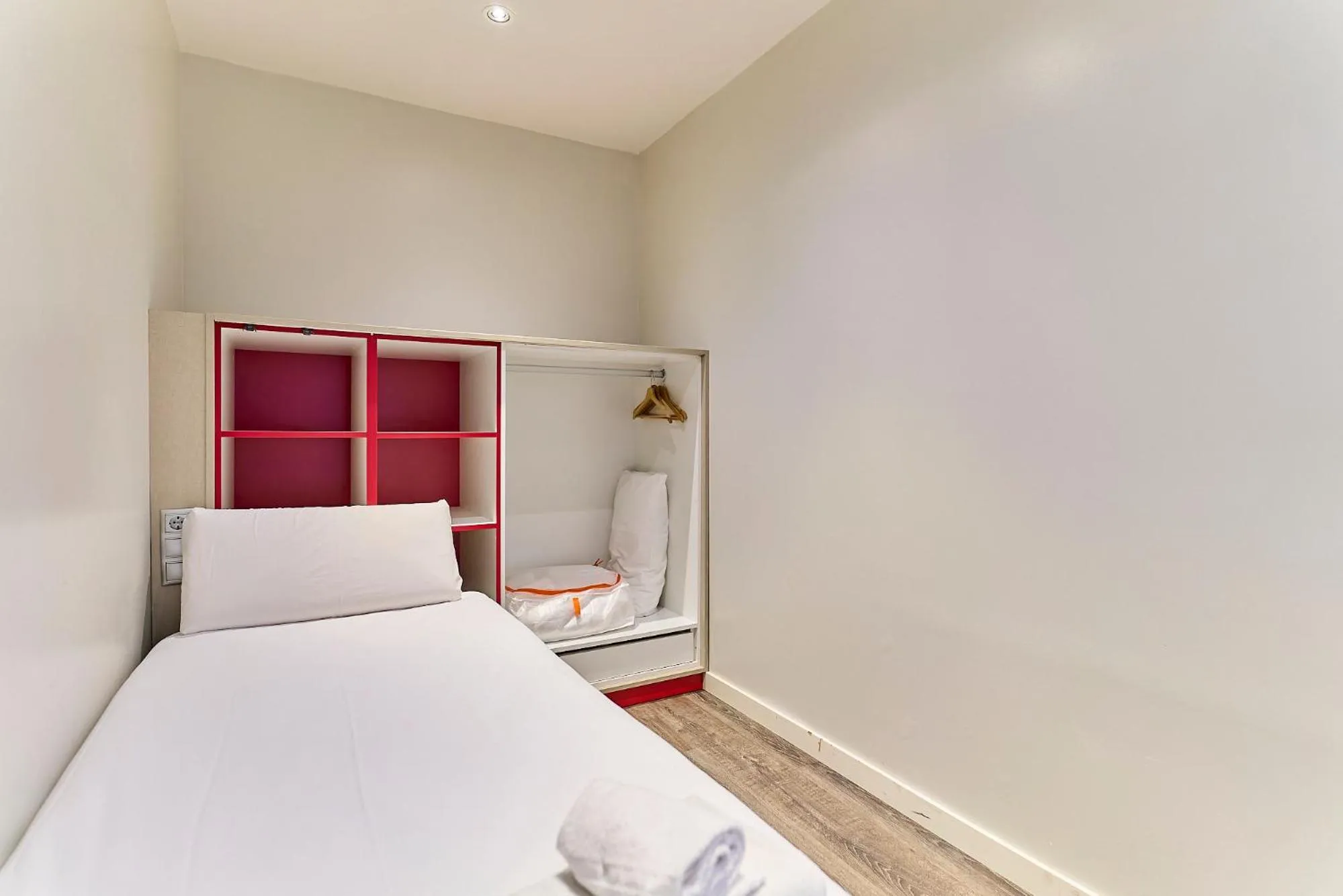 Bed in Montserrat Apartments by gaiarooms