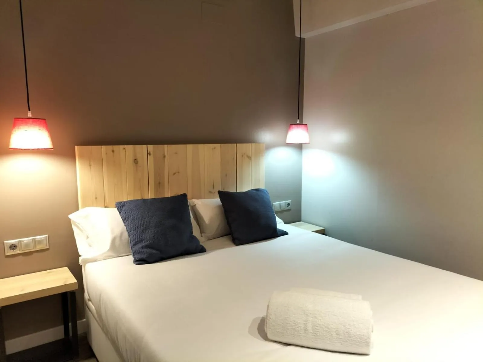 Bed in Montserrat Apartments by gaiarooms