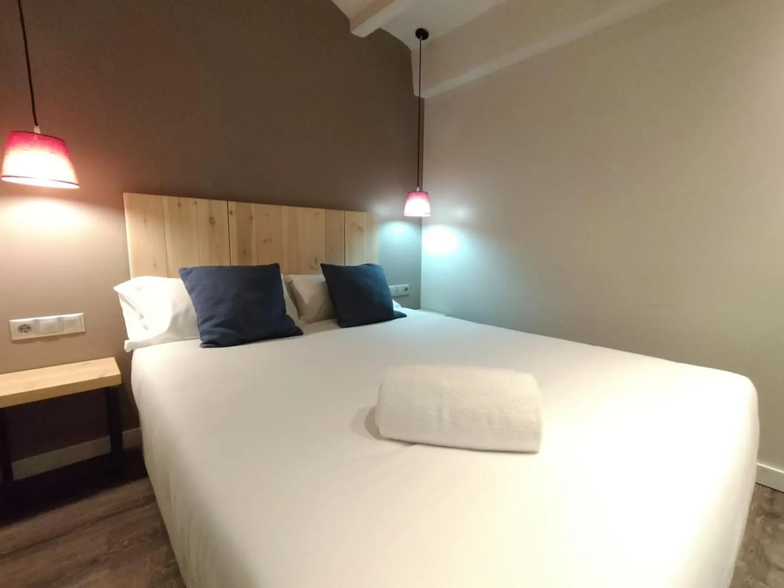 Bed in Montserrat Apartments by gaiarooms