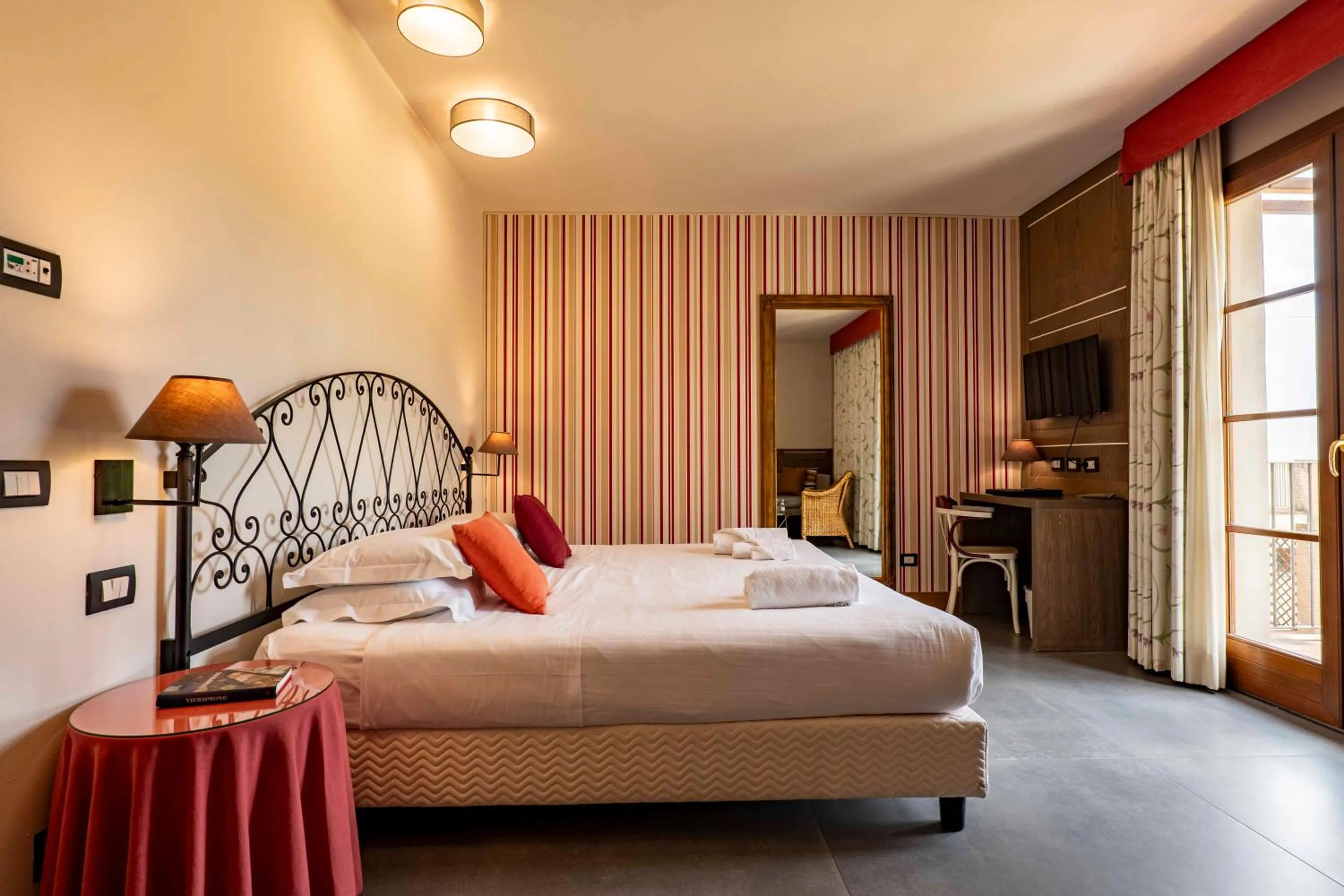 Photo of the whole room, Bed in Villasanpaolo Resort & Spa