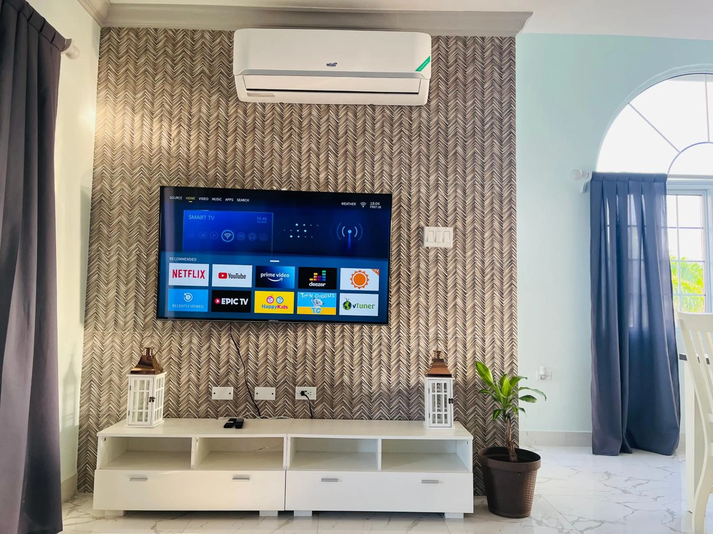 TV and multimedia in Luxury Apartments and Rooms,The Lagoons