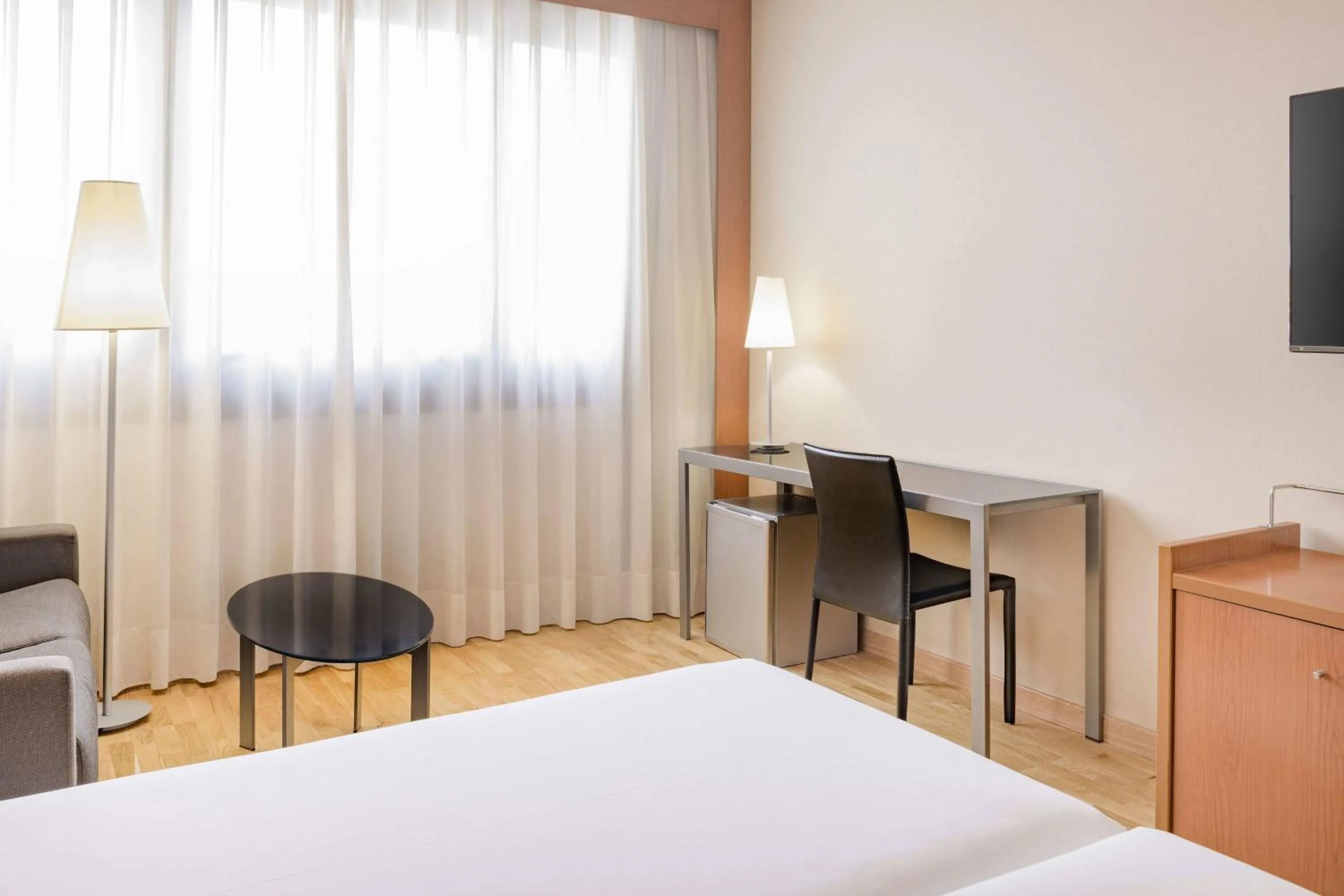 Photo of the whole room, Bed in AC Hotel Genova by Marriott