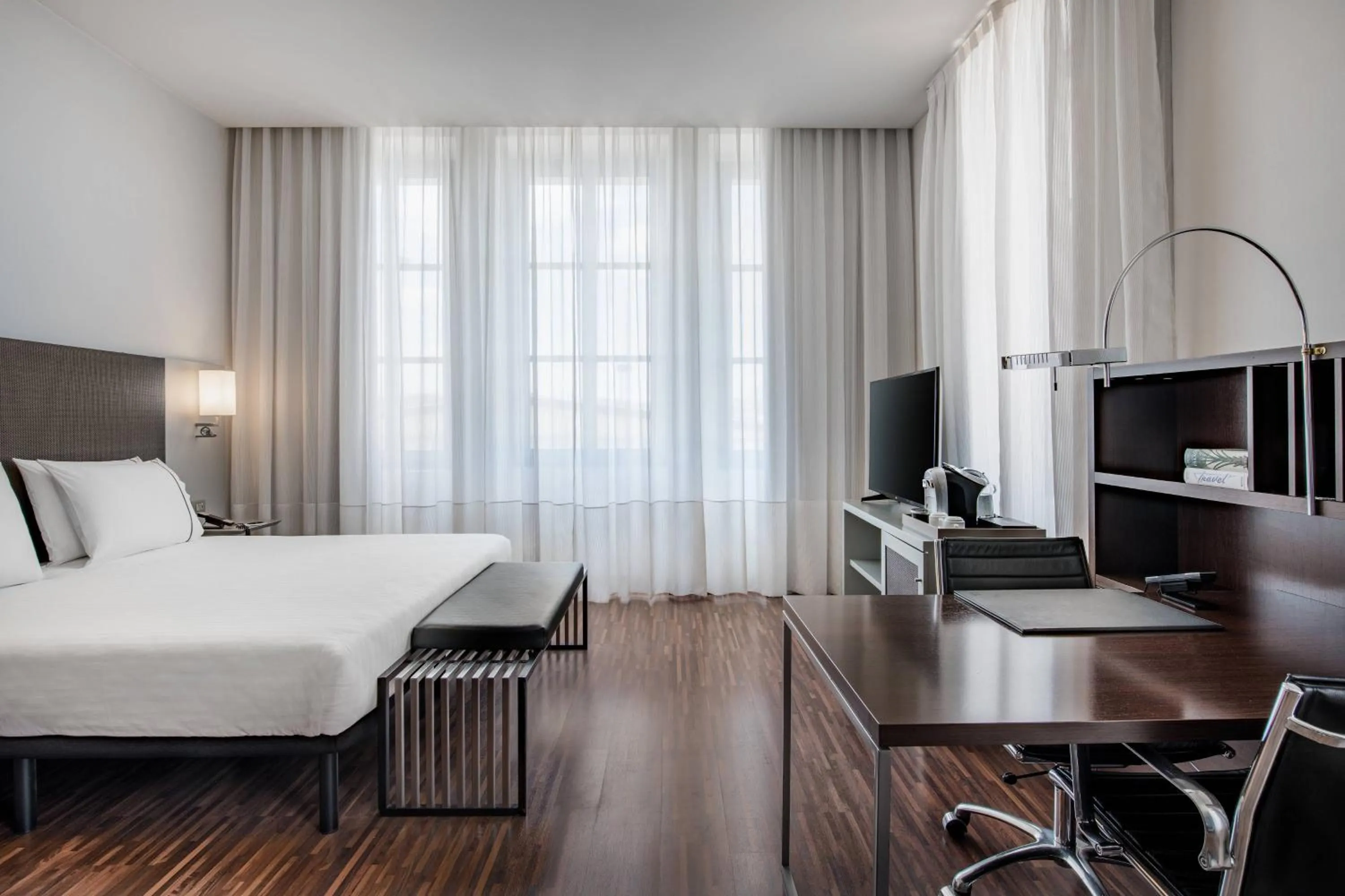 Photo of the whole room, Bed in AC Hotel Torino by Marriott