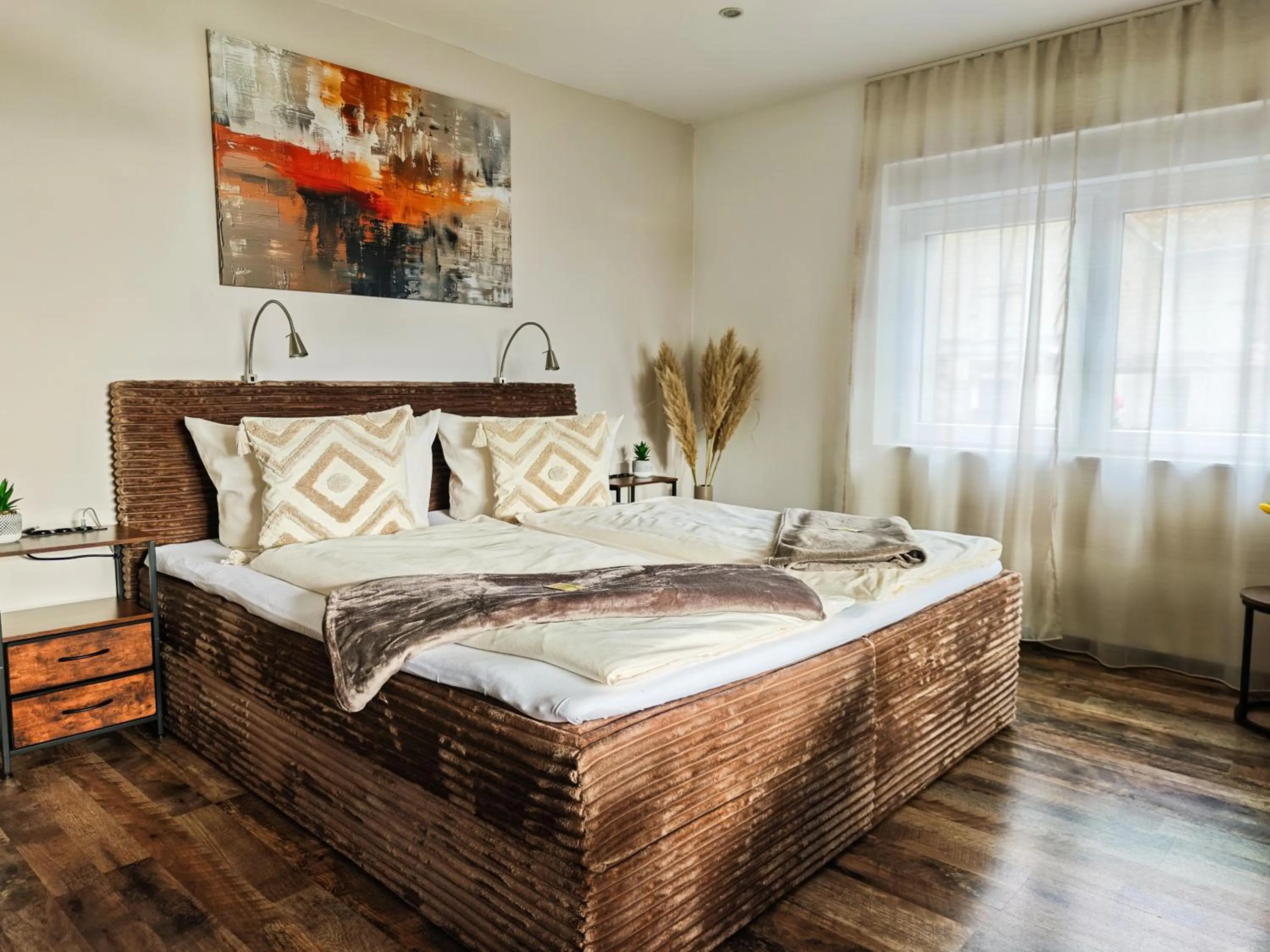 Bed in CJS Apartments - Chill or Drive am Nürburgring, new Box Spring Beds, new furniture, WLan, Spacious Rooms, Quiet Location