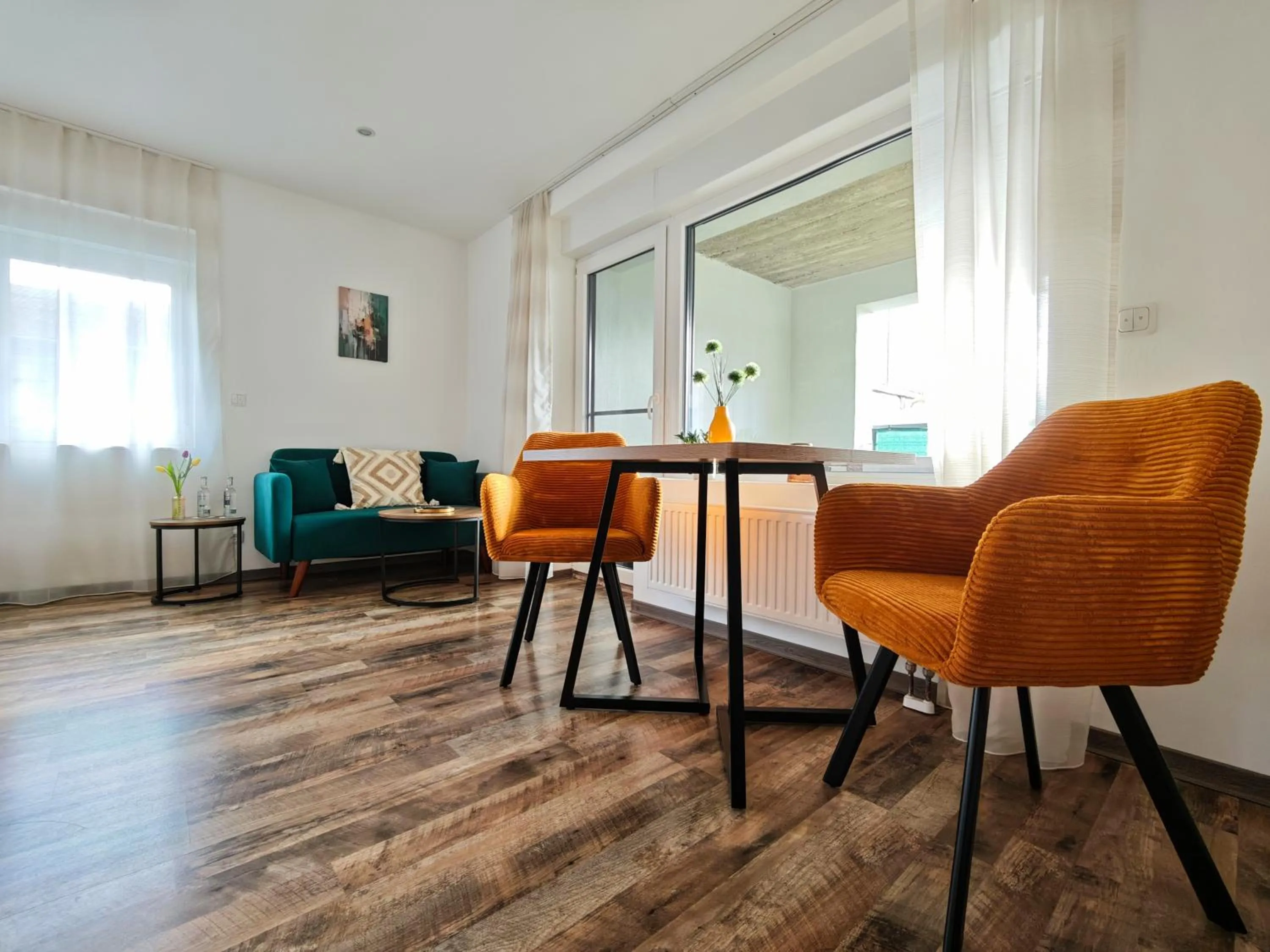 Photo of the whole room in CJS Apartments - Chill or Drive am Nürburgring, new Box Spring Beds, new furniture, WLan, Spacious Rooms, Quiet Location