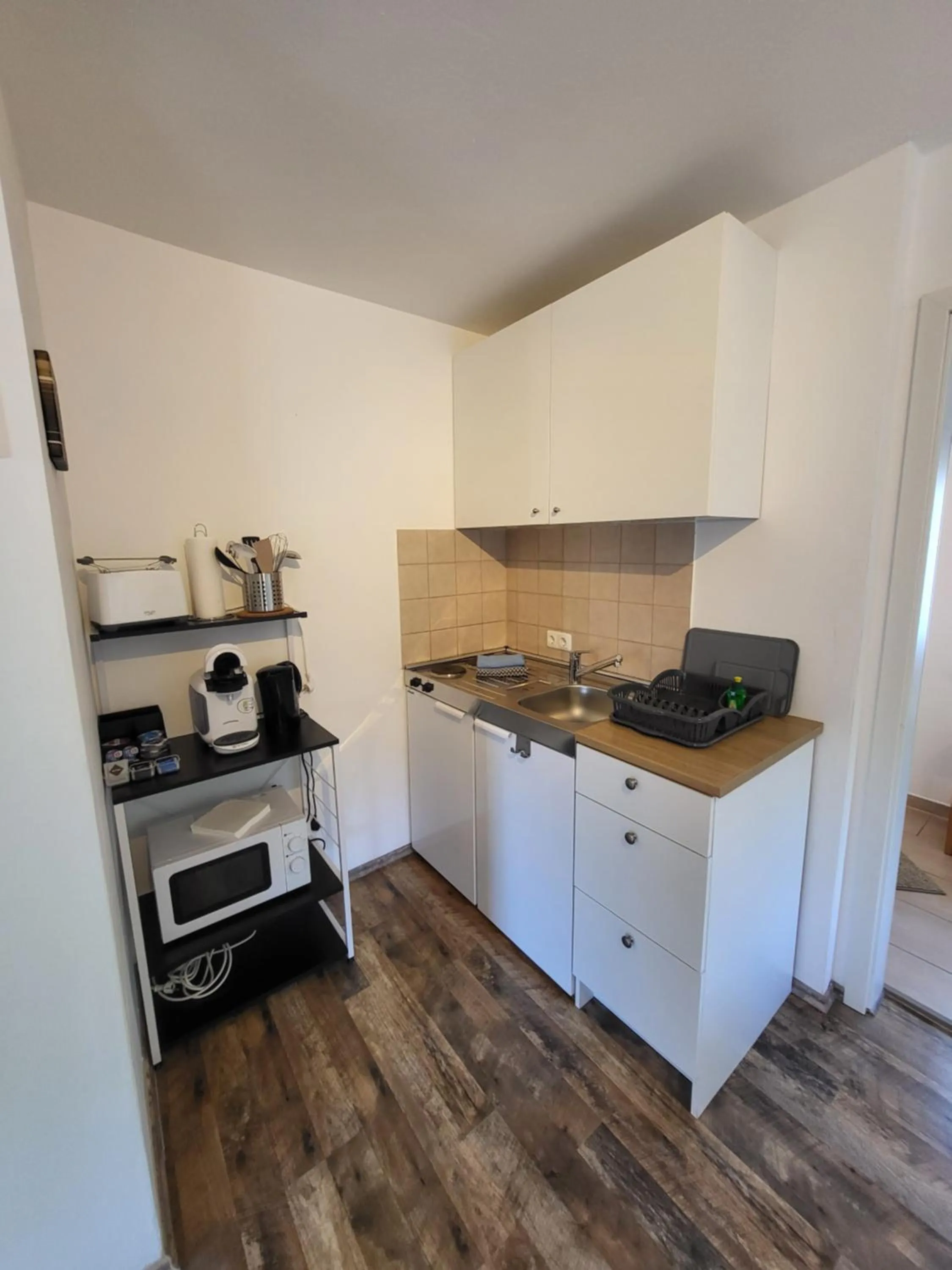 Kitchen or kitchenette in CJS Apartments - Chill or Drive am Nürburgring, Free Parking, WLan, Spacious Rooms, Quiet Location