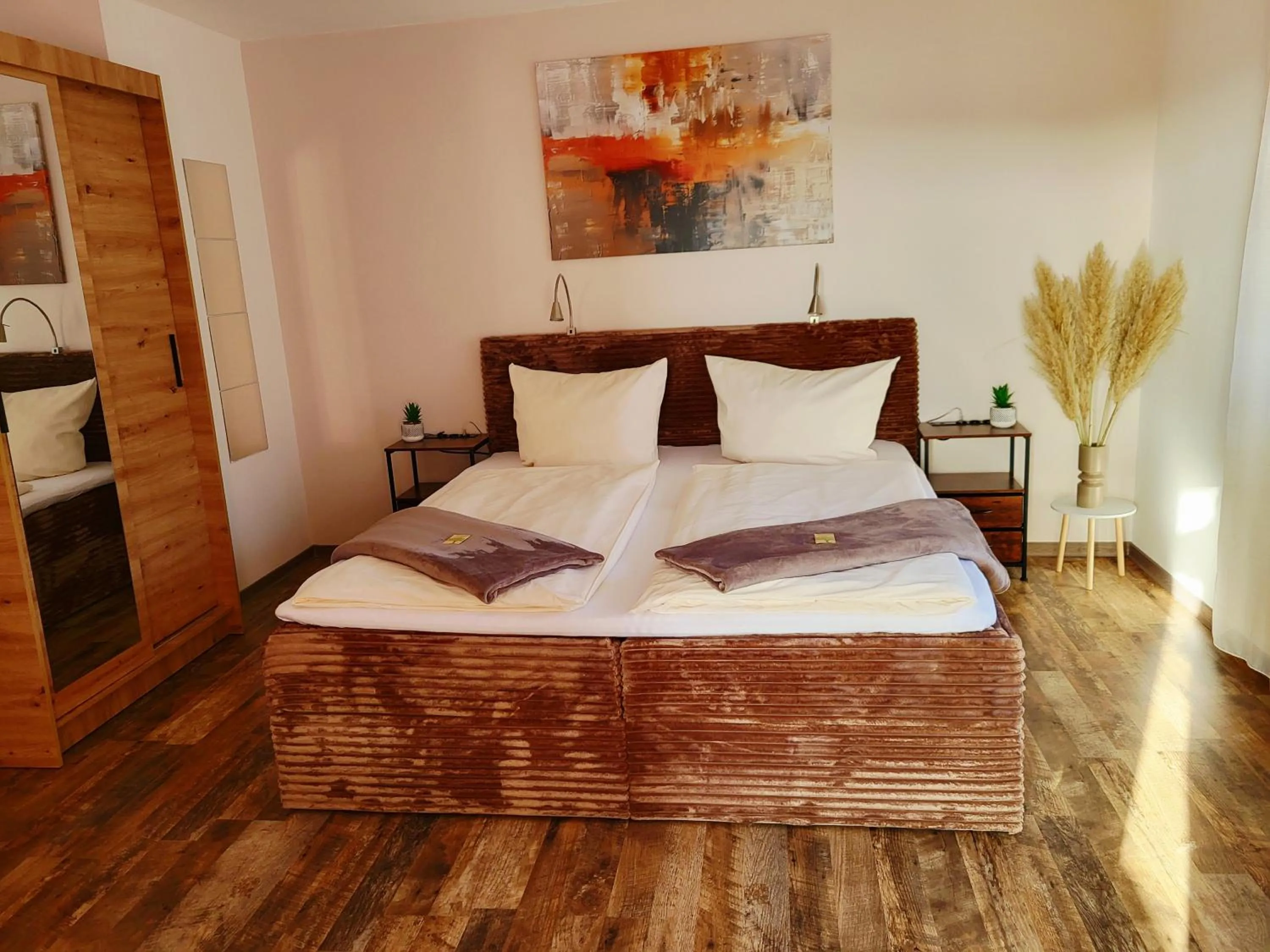 Bed in CJS Apartments - Chill or Drive am Nürburgring, new Box Spring Beds, new furniture, WLan, Spacious Rooms, Quiet Location