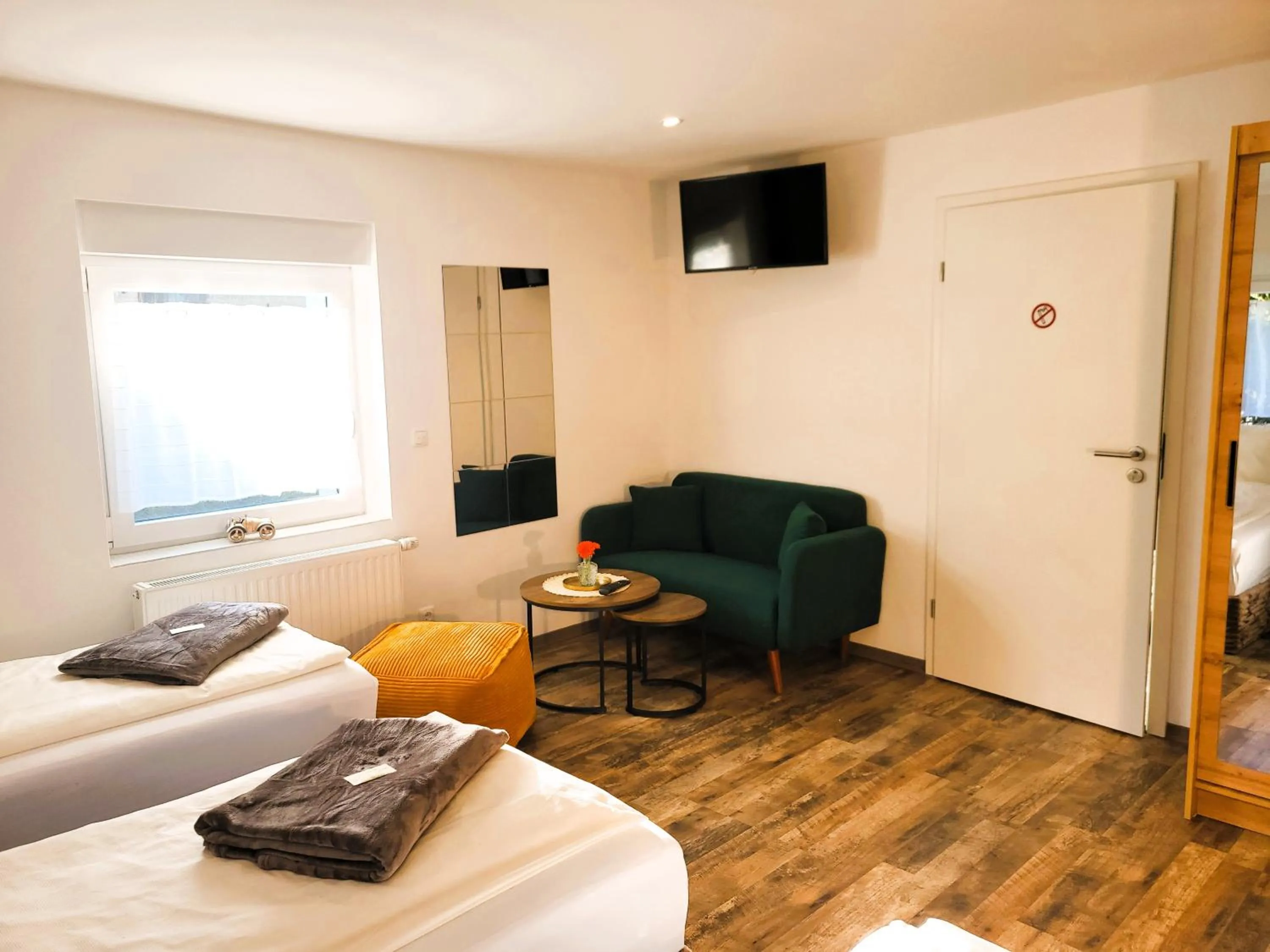 Photo of the whole room, Bed in CJS Apartments - Chill or Drive am Nürburgring, new Box Spring Beds, new furniture, WLan, Spacious Rooms, Quiet Location