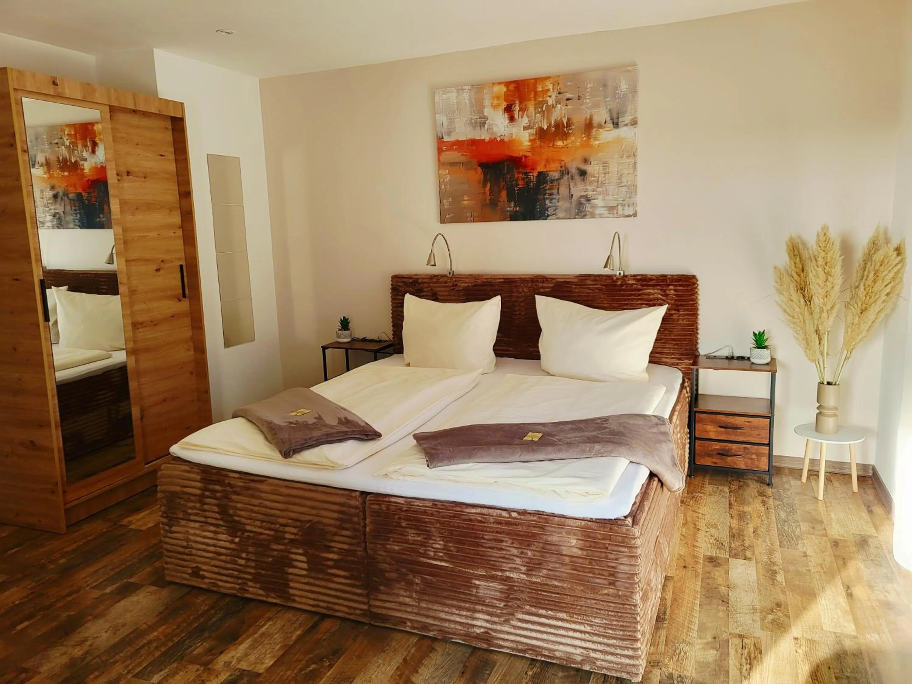 Bed in CJS Apartments - Chill or Drive am Nürburgring, new Box Spring Beds, new furniture, WLan, Spacious Rooms, Quiet Location