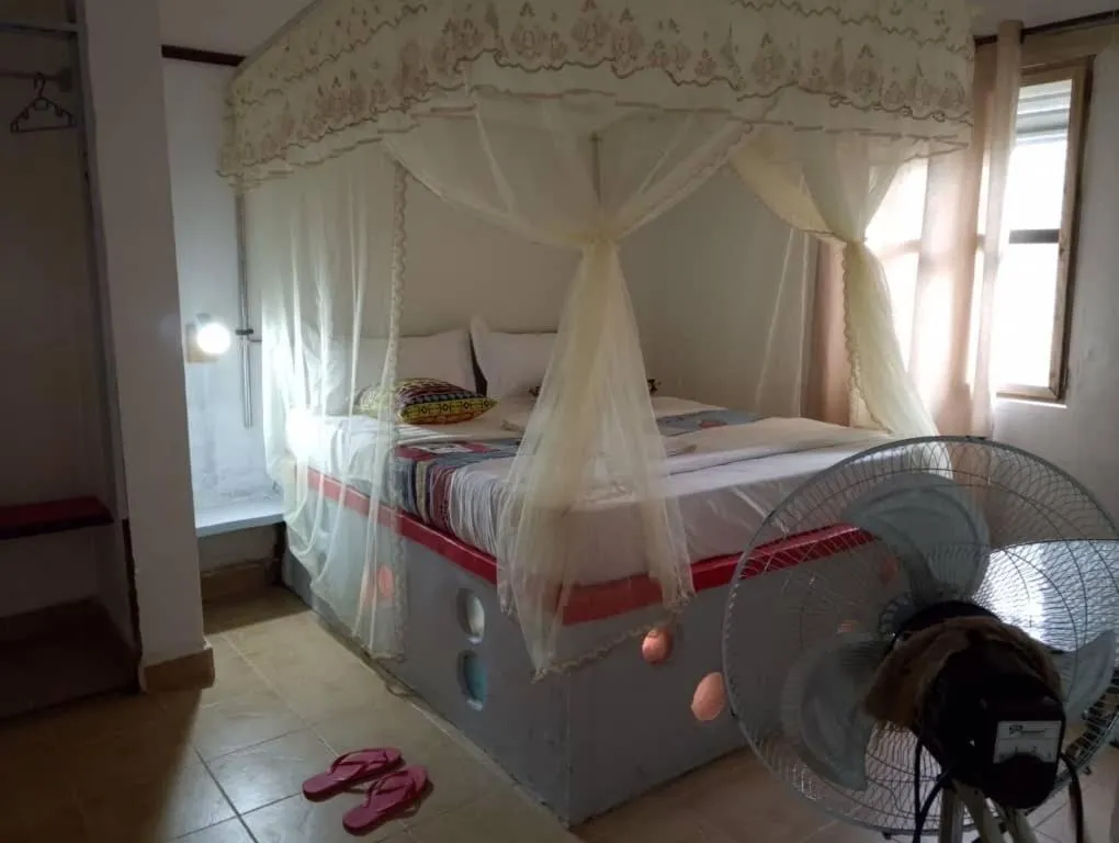 Bed in Richy Hotels and Safaris